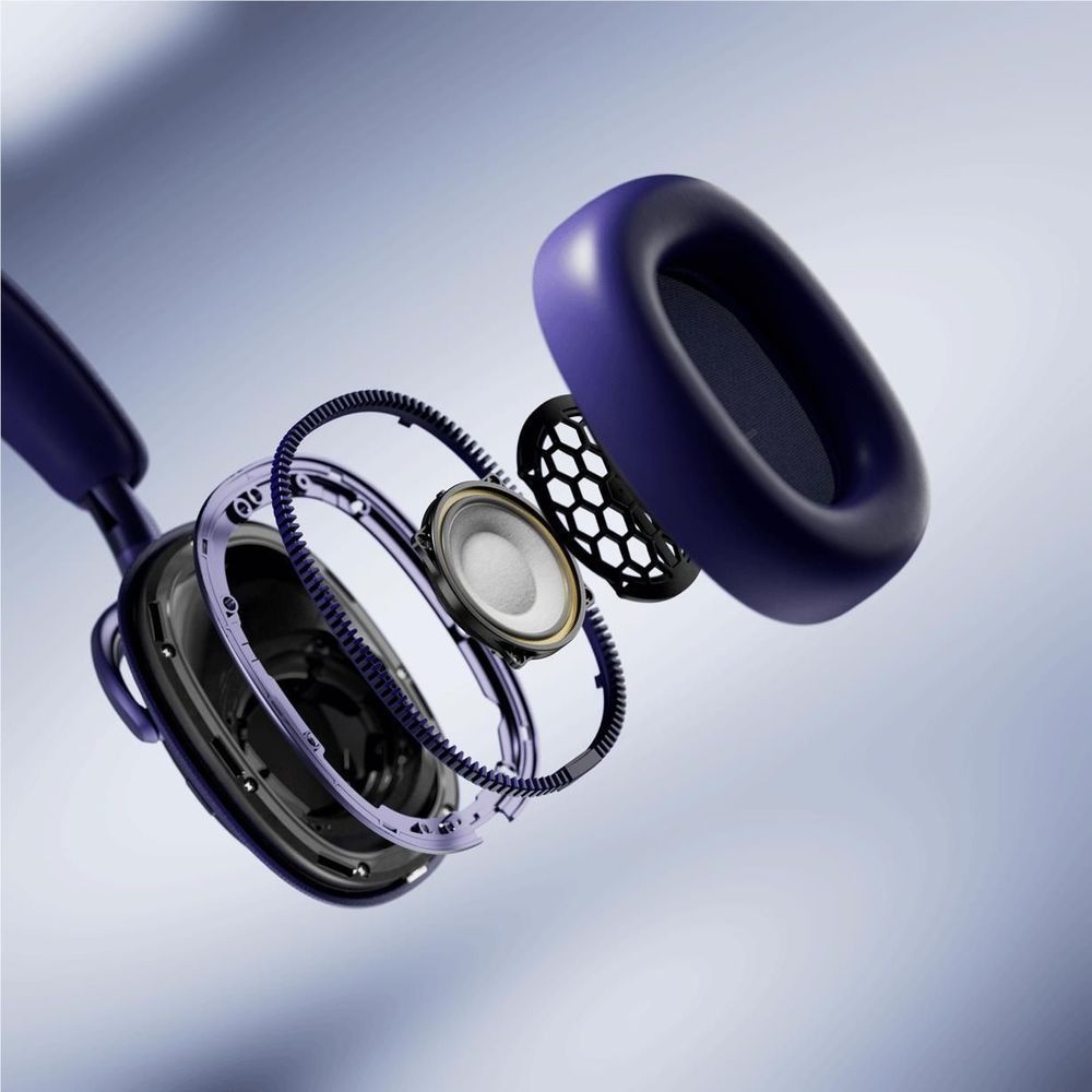 Indigo blue over-ear headphones showing internal driver components