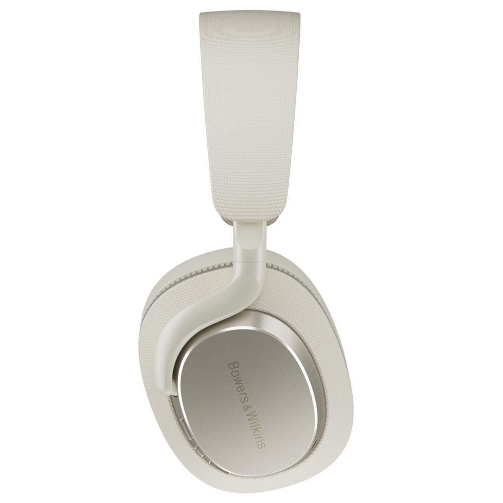 Canvas white headphones with visible headband and inner yoke, silver logo ring.