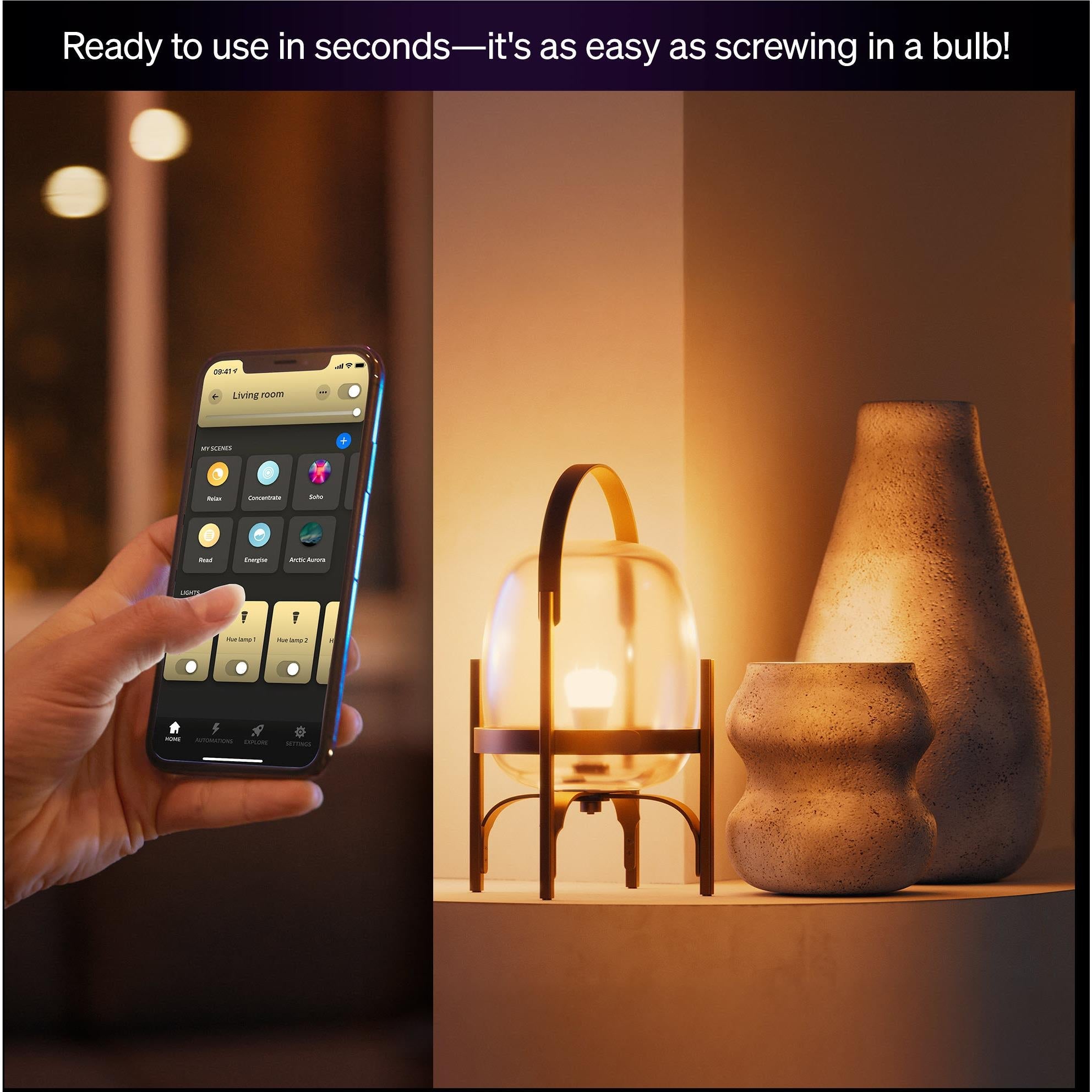 Smart LED bulb emitting warm light, visible bulb glow near a smartphone controller