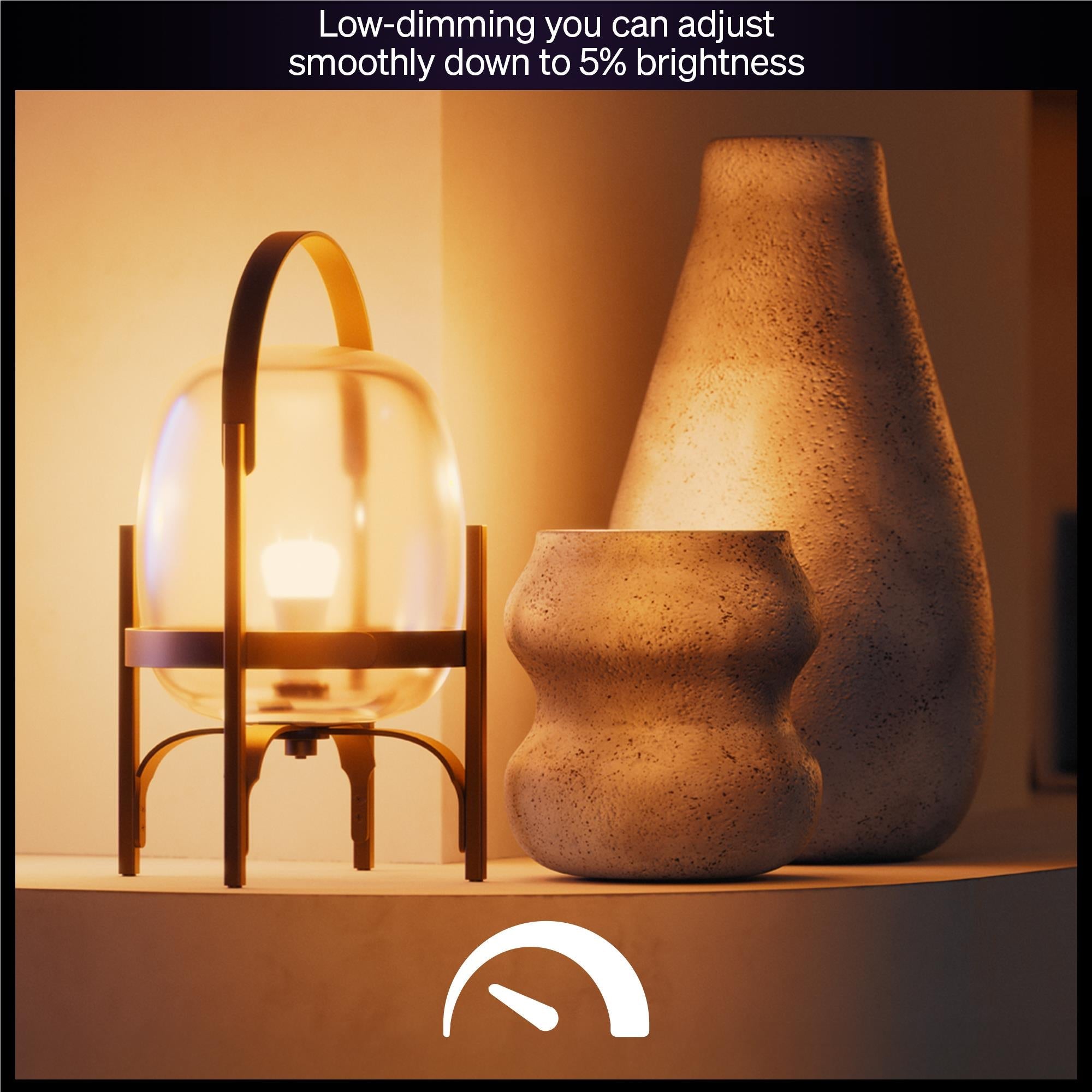 Warm white smart light bulbs glowing on shelf with decorative vases