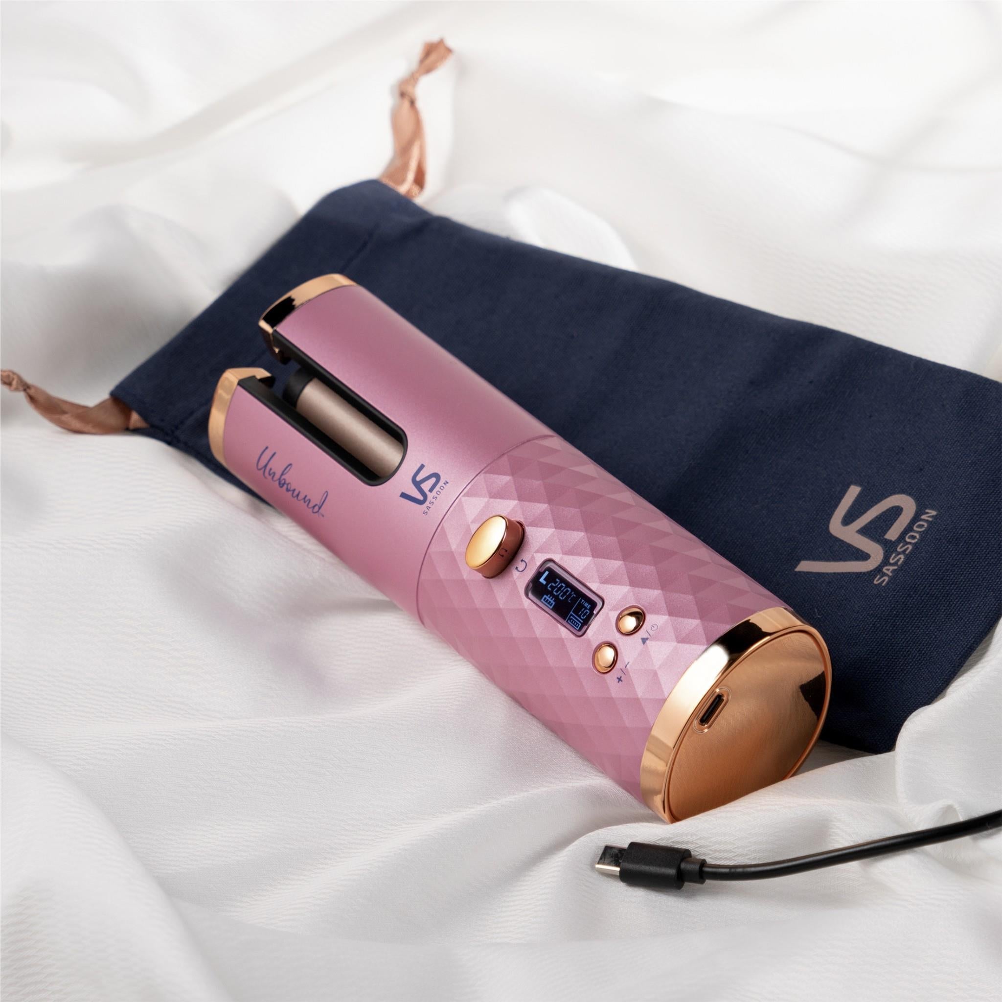 Pink cordless auto hair curler with digital display and bronze end cap