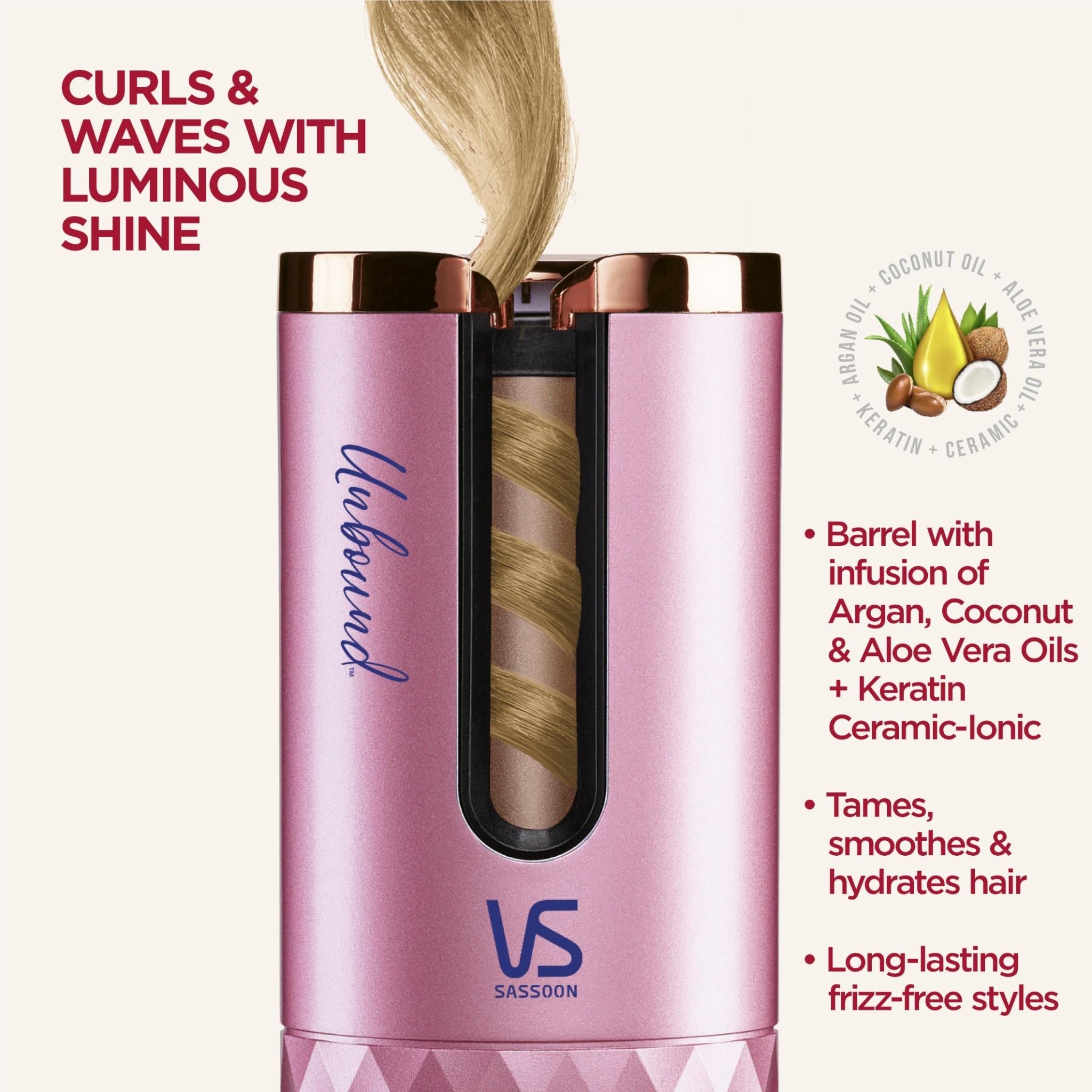 Pink auto hair curler close-up showing black barrel window and gold cap