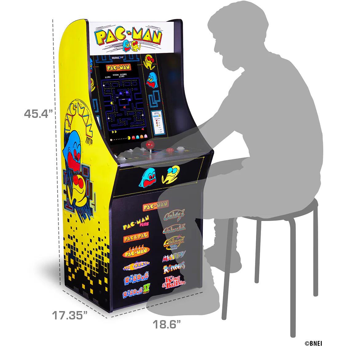 PAC-MAN stand-up arcade cabinet with yellow side, shown with size silhouette and measurements