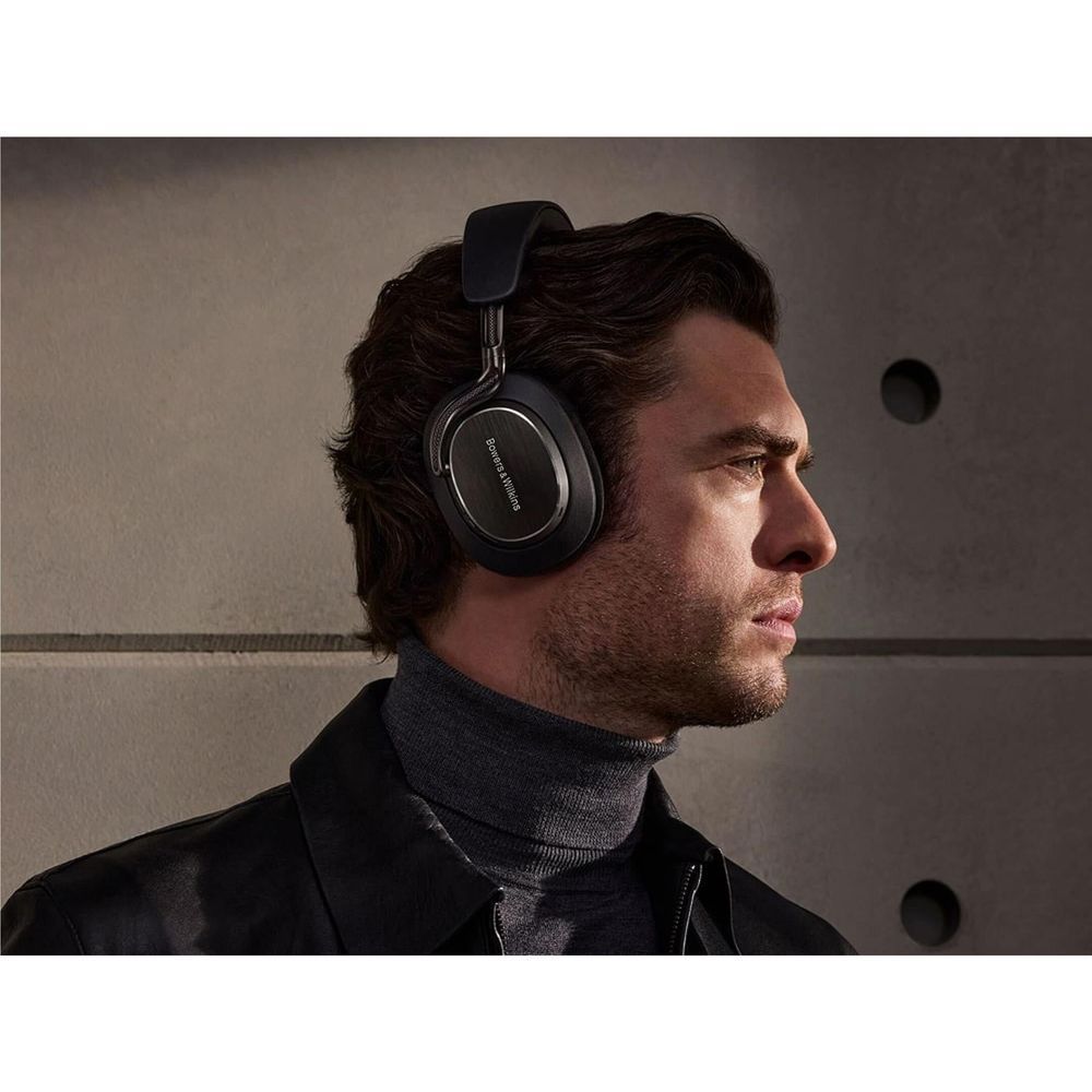Onyx black over-ear noise-cancelling headphones worn by a man