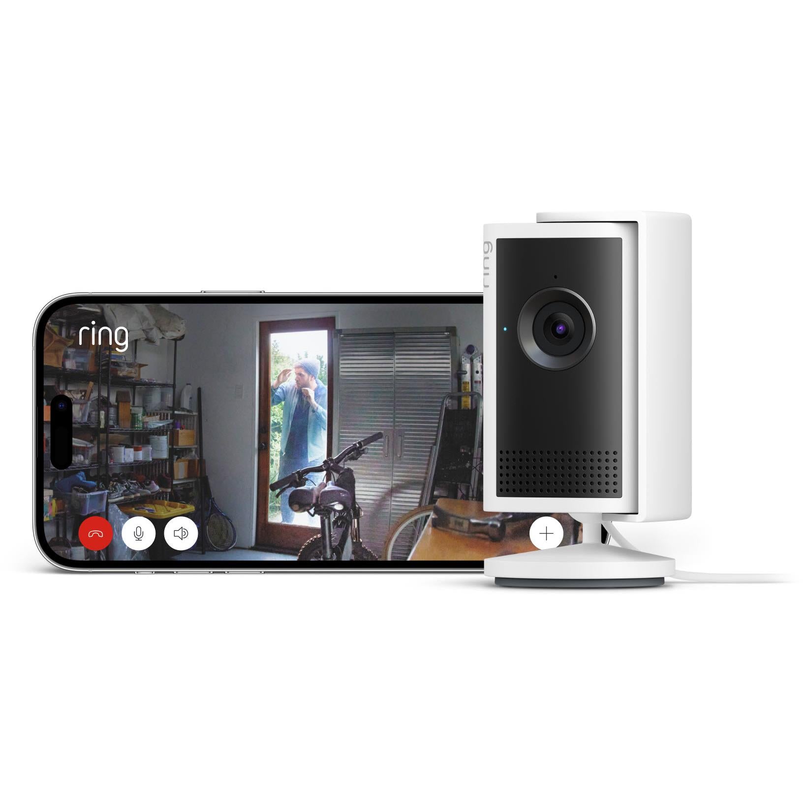 White plug-in indoor security camera on tabletop stand with front lens grille