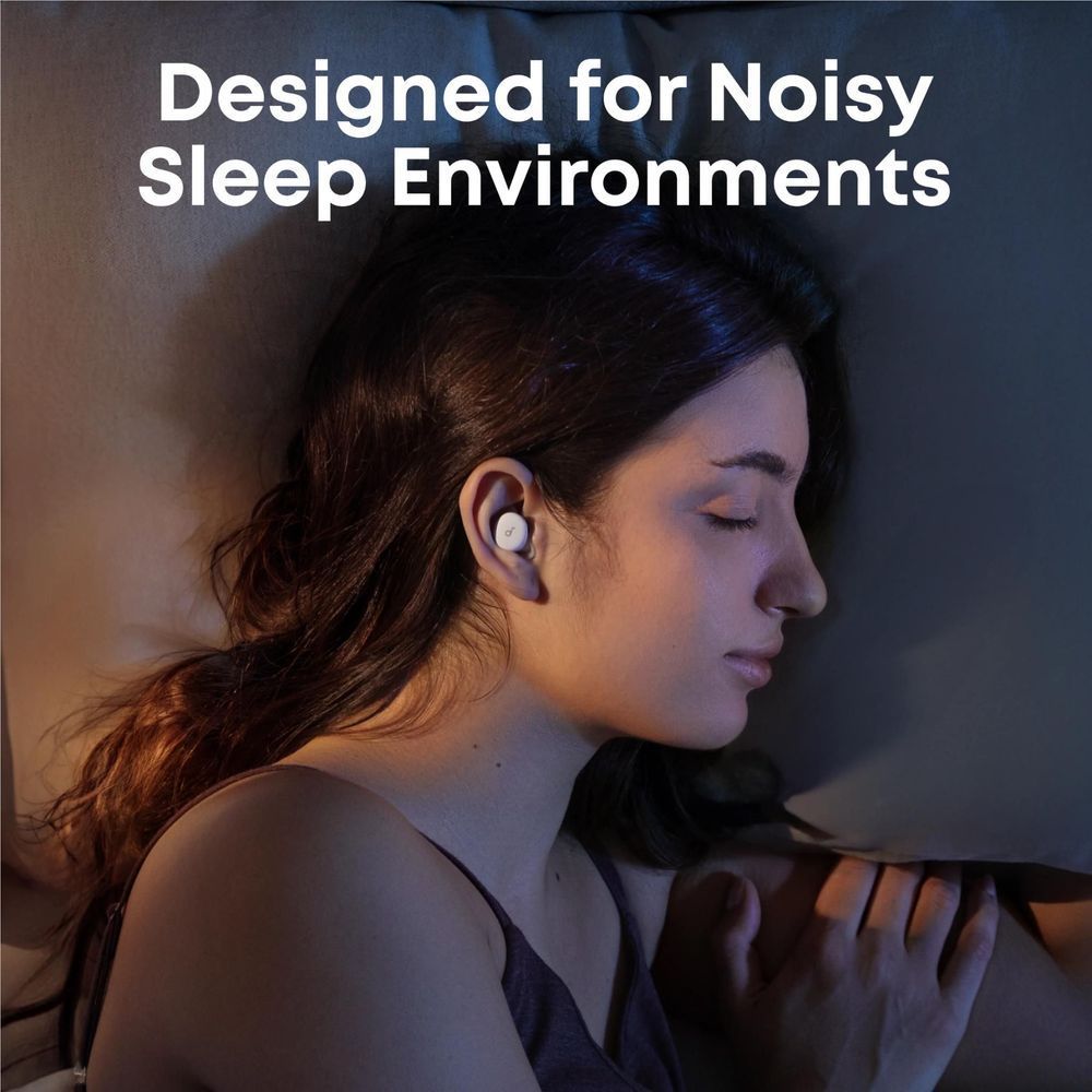 Wireless sleep earbuds in a woman's ear during side sleep