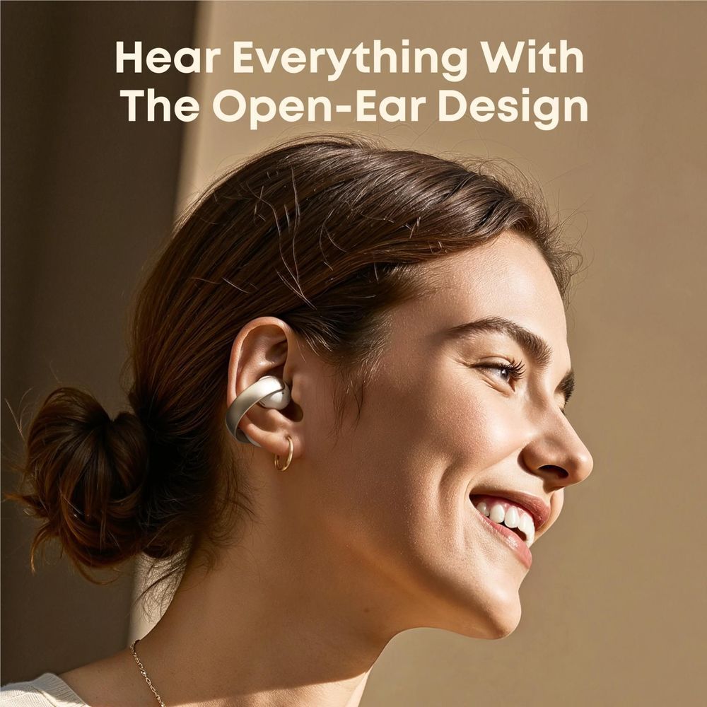soundcore open-ear clip-on earbuds in white on ear, open-ear design