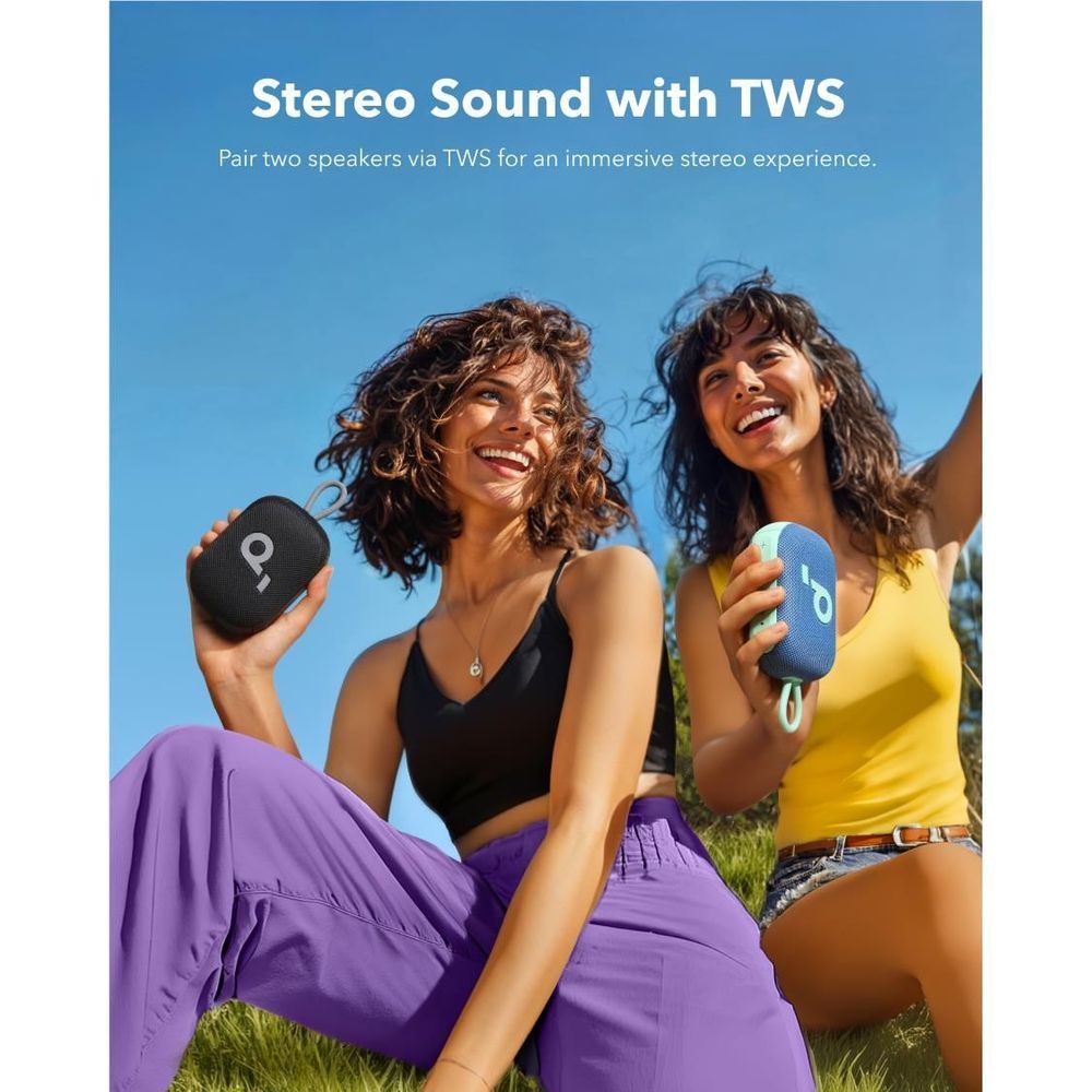 Two handheld Bluetooth speakers in black and blue held outdoors