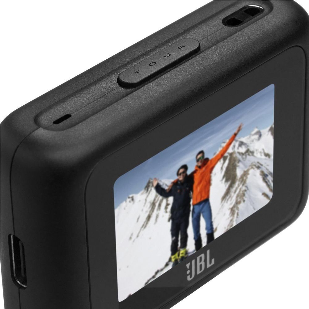 JBL wireless transmitter close-up with touch controls above the screen