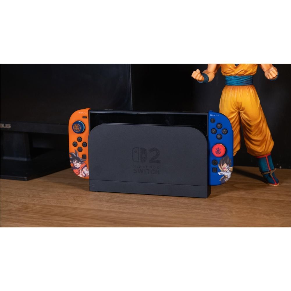 Orange and blue Blade controllers with Dragon Ball Z decals on a Switch console