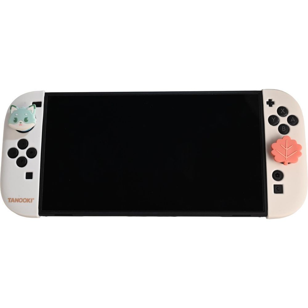 White Nintendo Switch 2 controller with cat panel left and coral leaf panel right