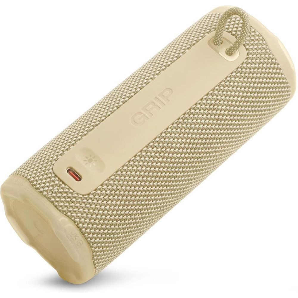 Yellow JBL Grip compact speaker with rear control panel and charging port cover.
