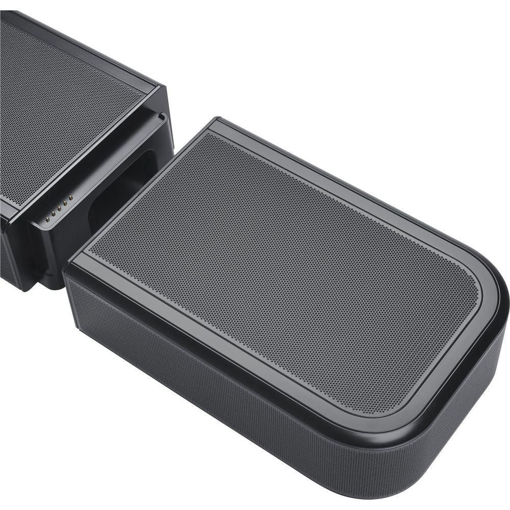 Black subwoofer with textured metal grille and rounded speaker frame
