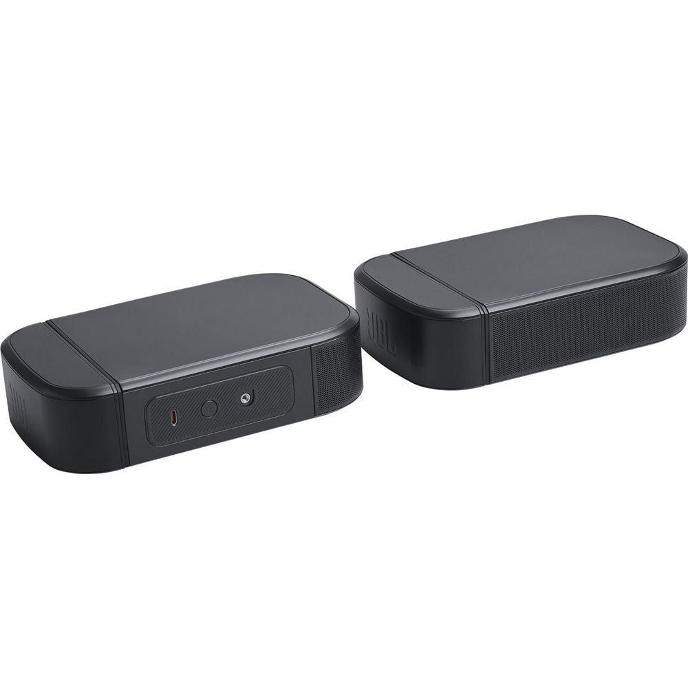 Two black detachable speakers with textured sides and smooth top surfaces