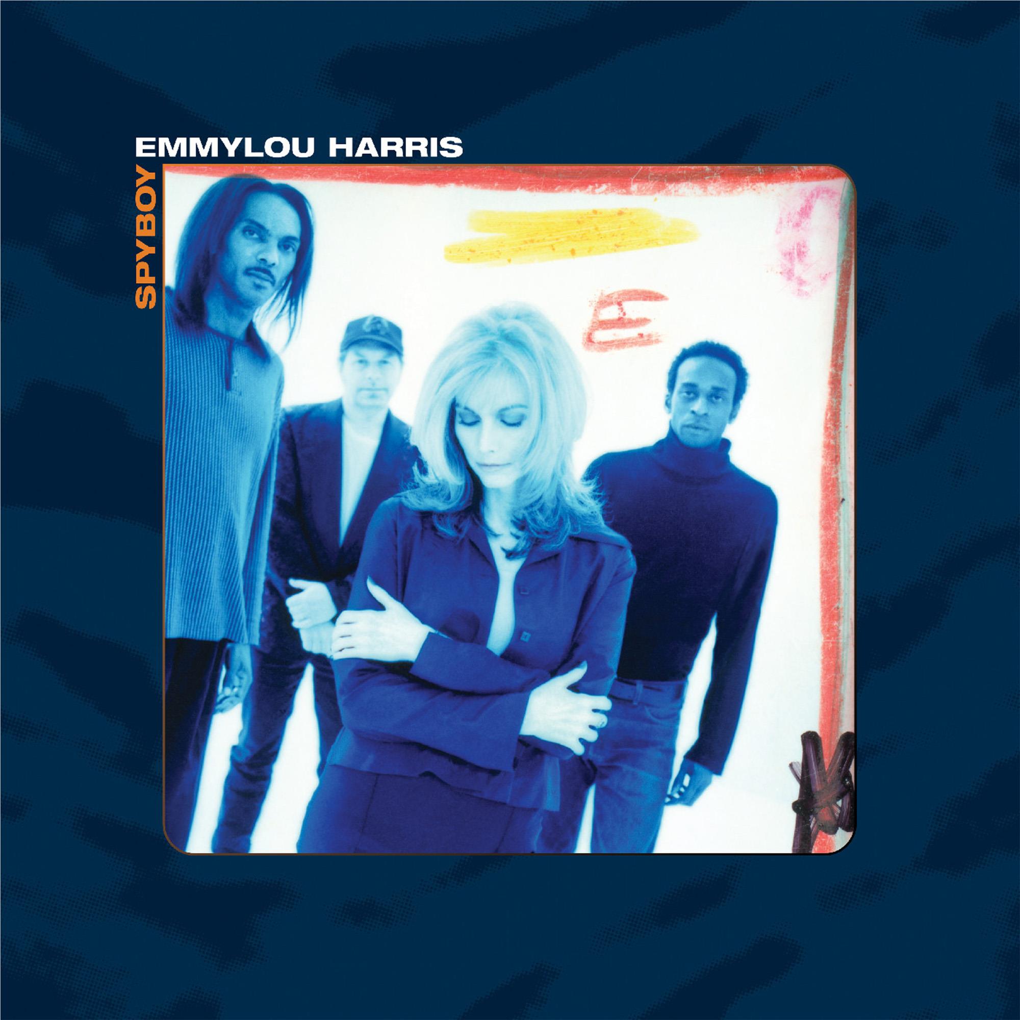 Rectangular album cover with group photo, blue tones, and colorful title text