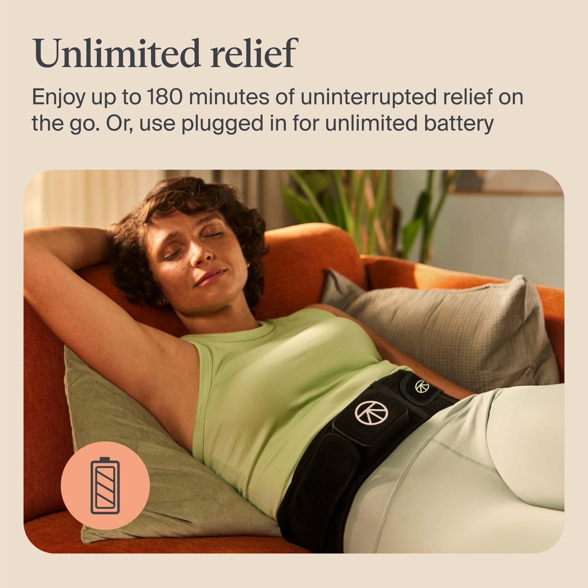Therabody lower back wrap with LED panel on a person lying down