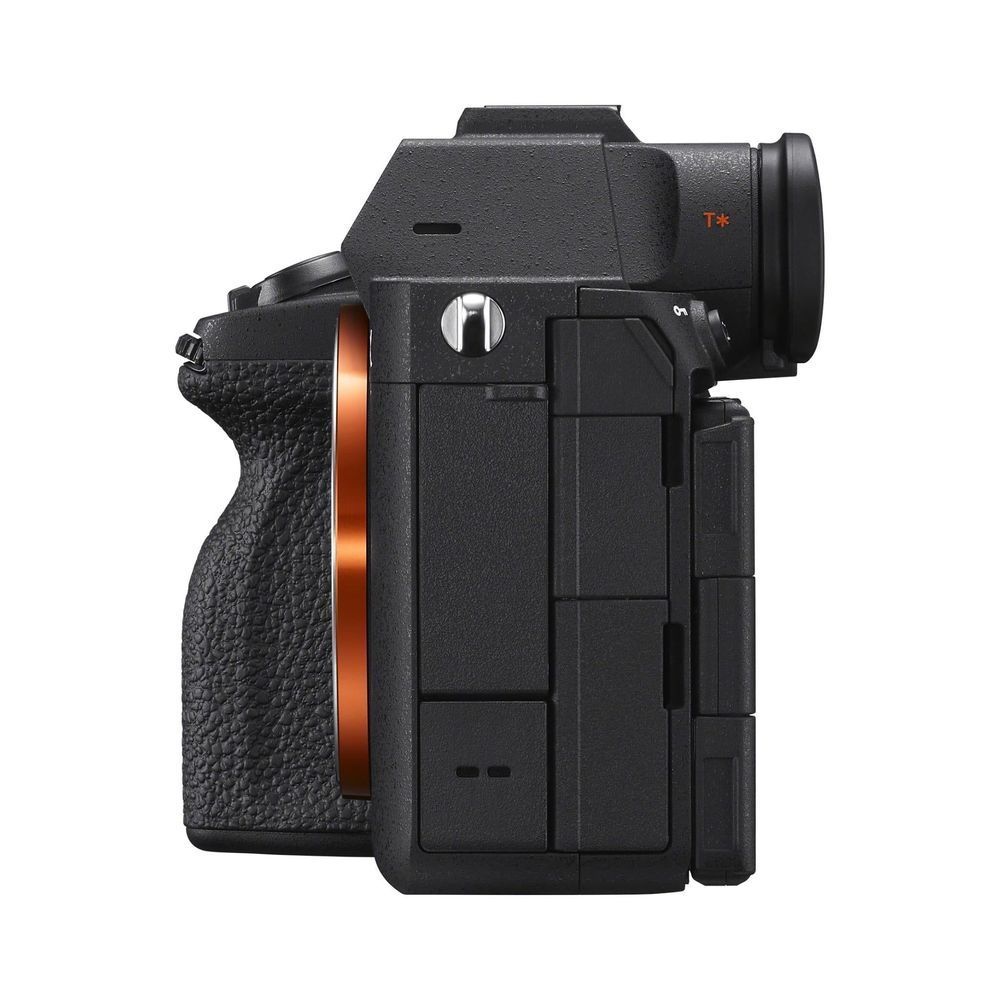 Black mirrorless camera body side view with textured grip and orange-accent edge