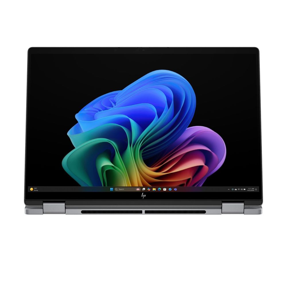 Silver 2-in-1 OLED laptop, front view with open screen and backlit keyboard