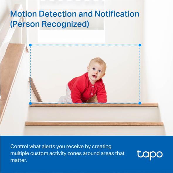 Indoor pan-and-tilt camera view with activity zone frame around a baby