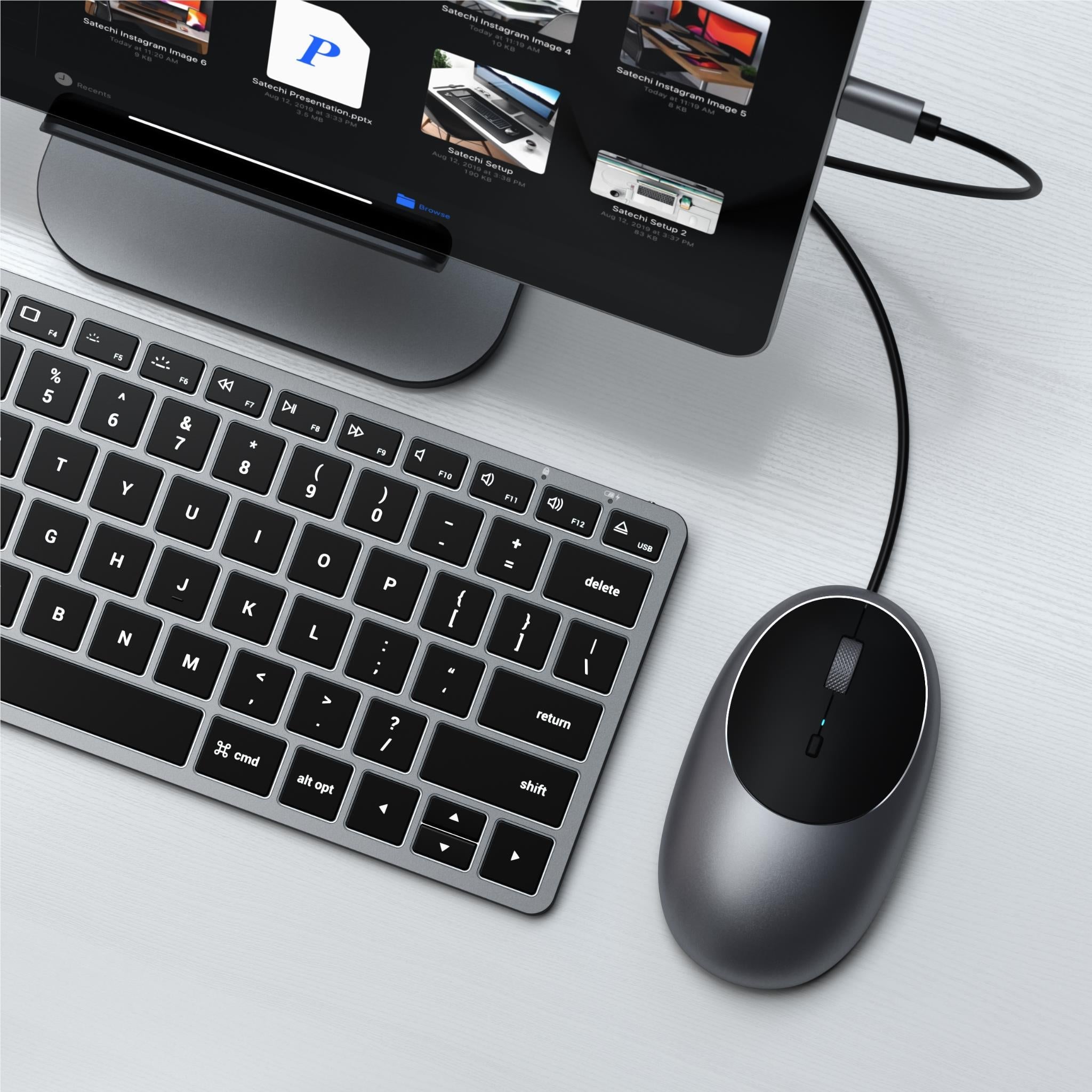Space grey wired optical mouse, overhead view with cable