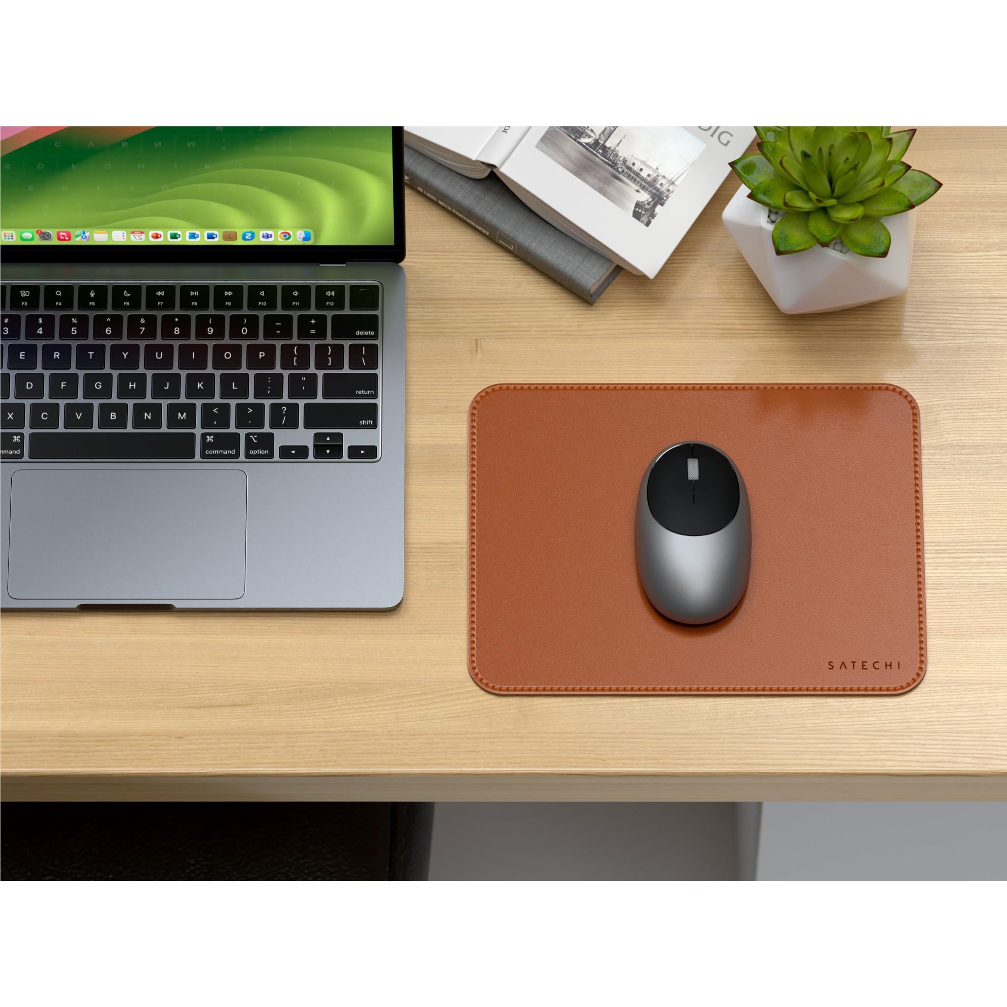 Brown vegan leather mouse pad with optical mouse on top