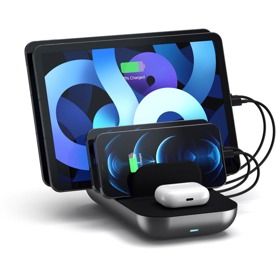 Black desk charging station with wireless pad holding a small device