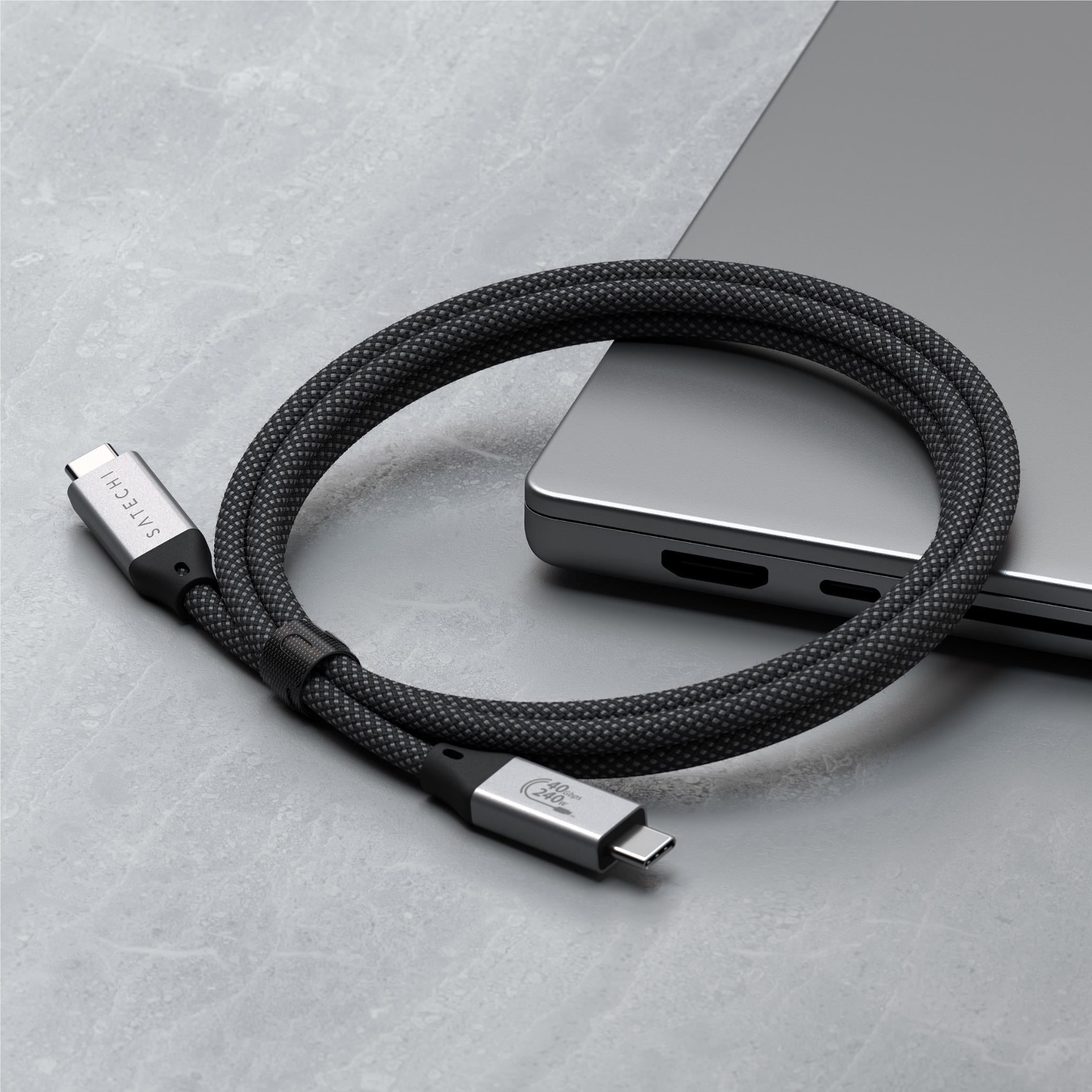 Black braided USB-C to USB-C cable with silver connectors and built-in openings