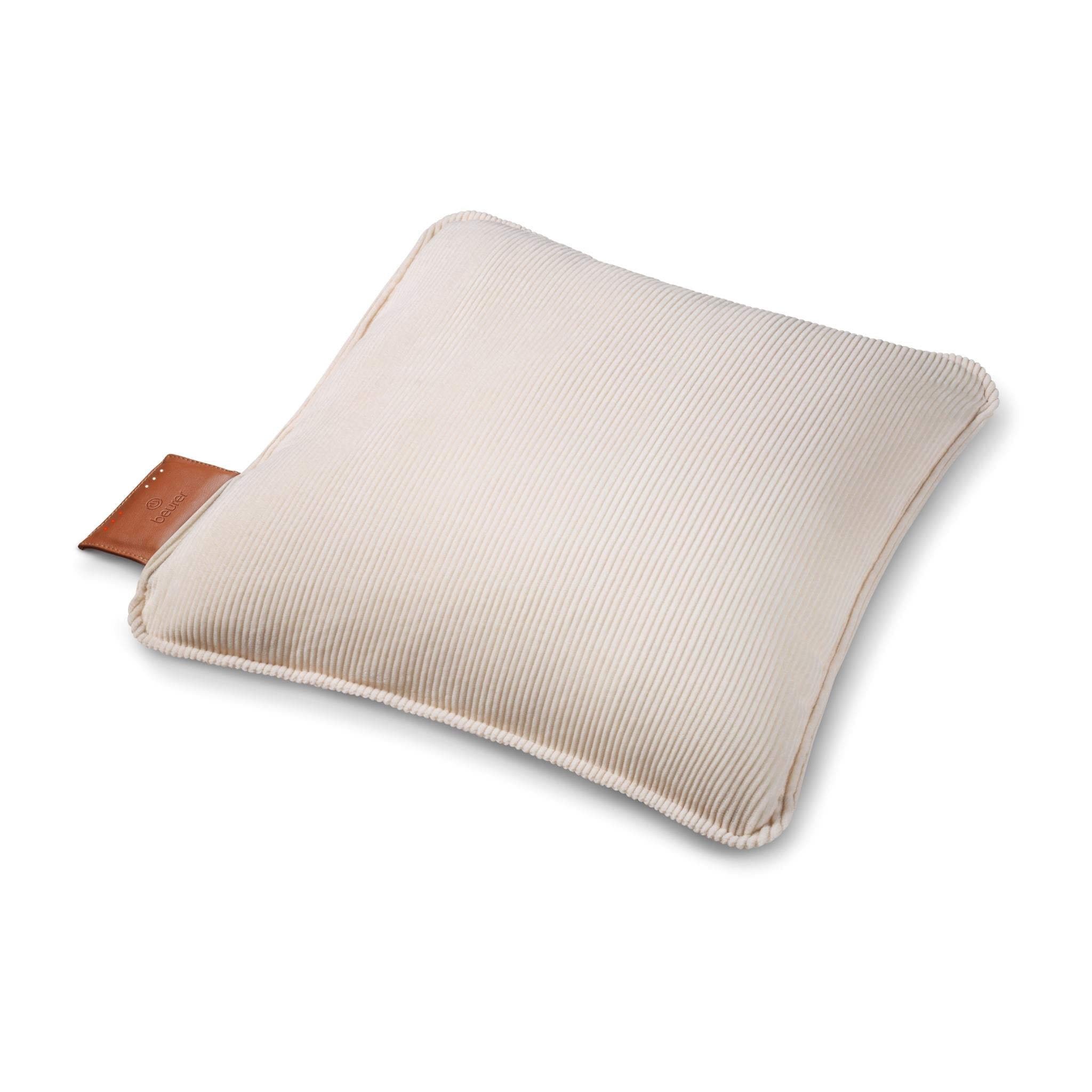 Rectangular heated cushion with light cream ribbed cover and brown leather control tag.