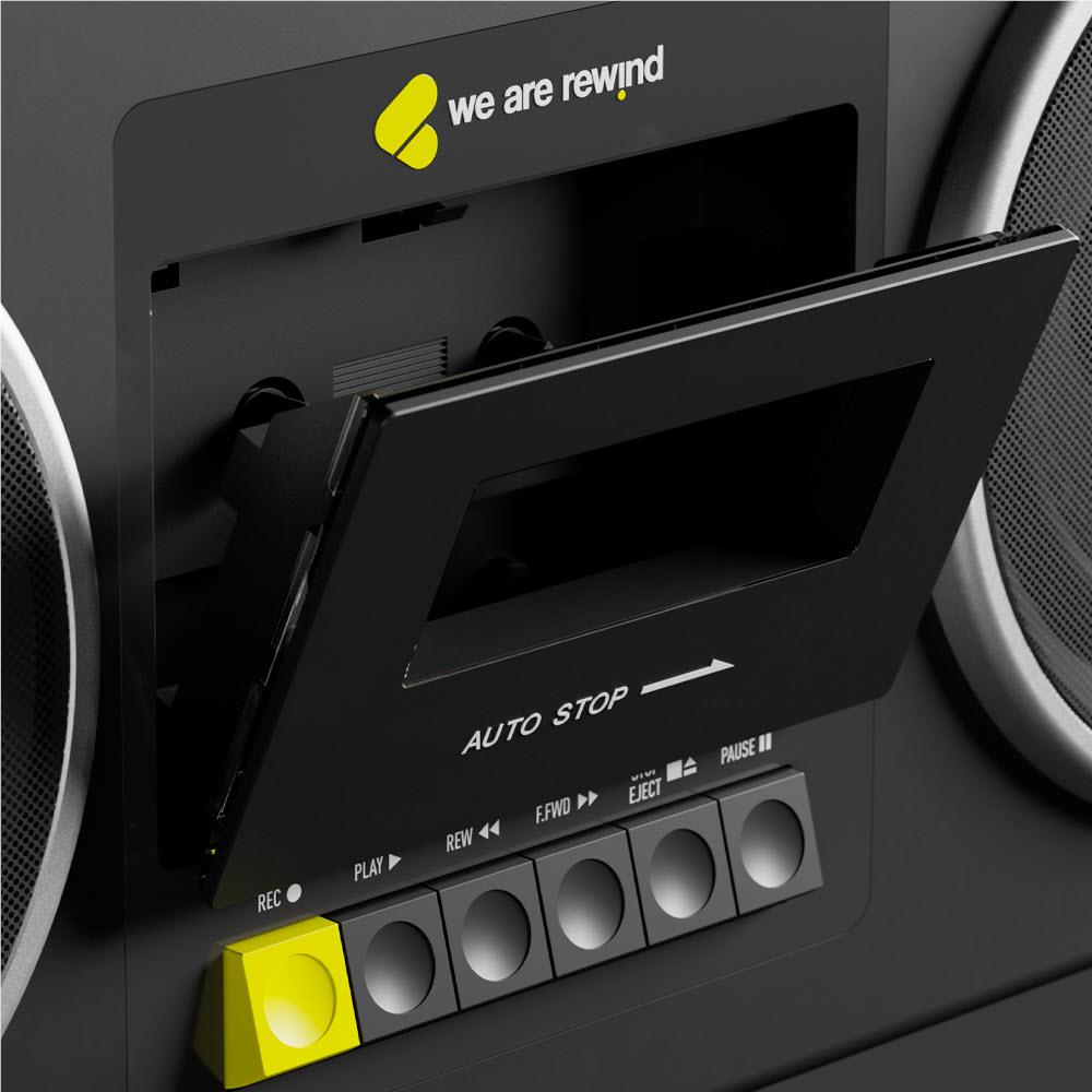 Black cassette boombox close-up of cassette controls and AUTO STOP button
