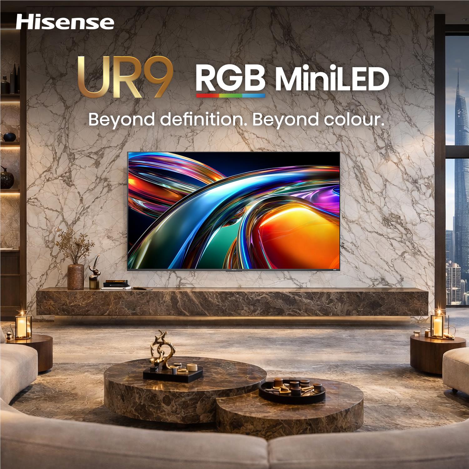 Hisense RGB miniLED smart TV mounted on wall, showing colorful abstract screen