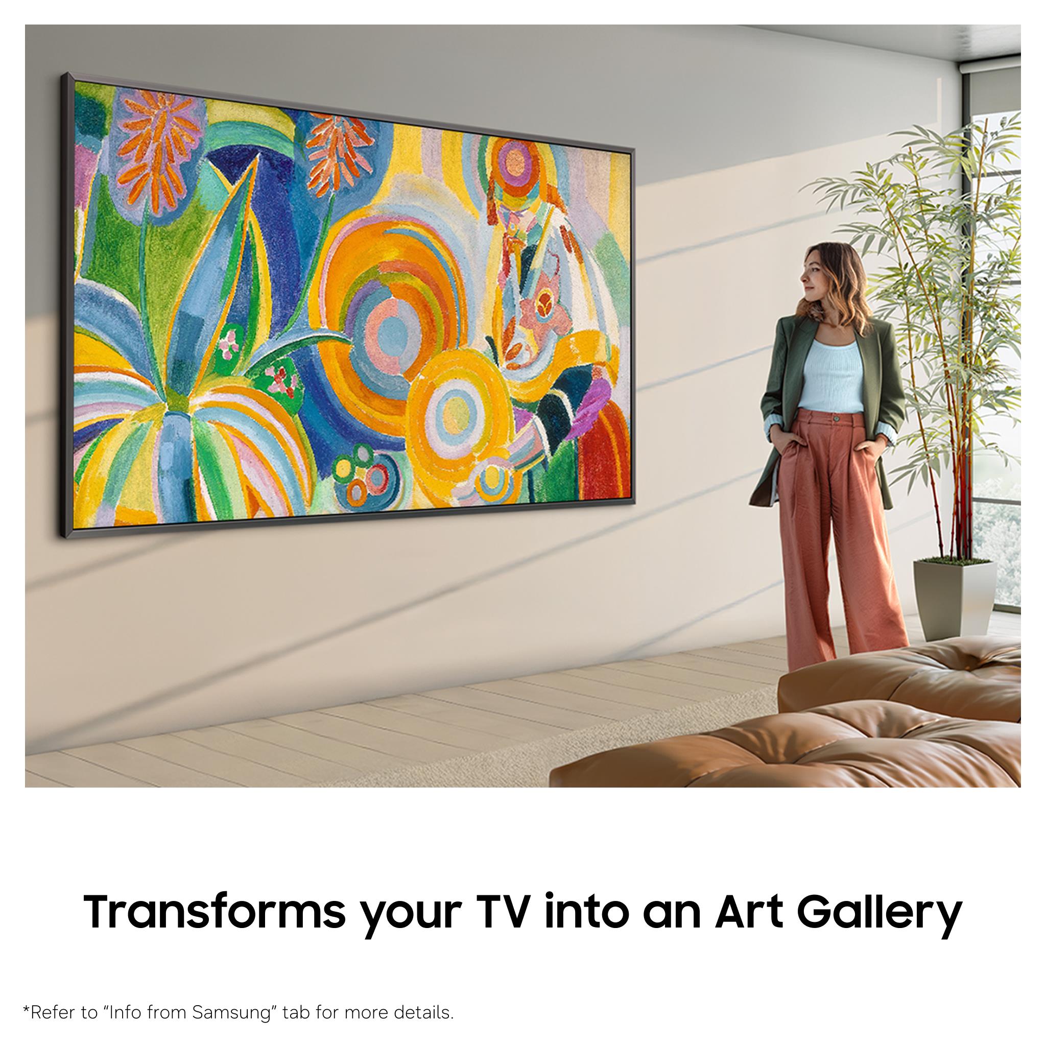 Framed Samsung QLED TV showing colorful abstract artwork in a living room