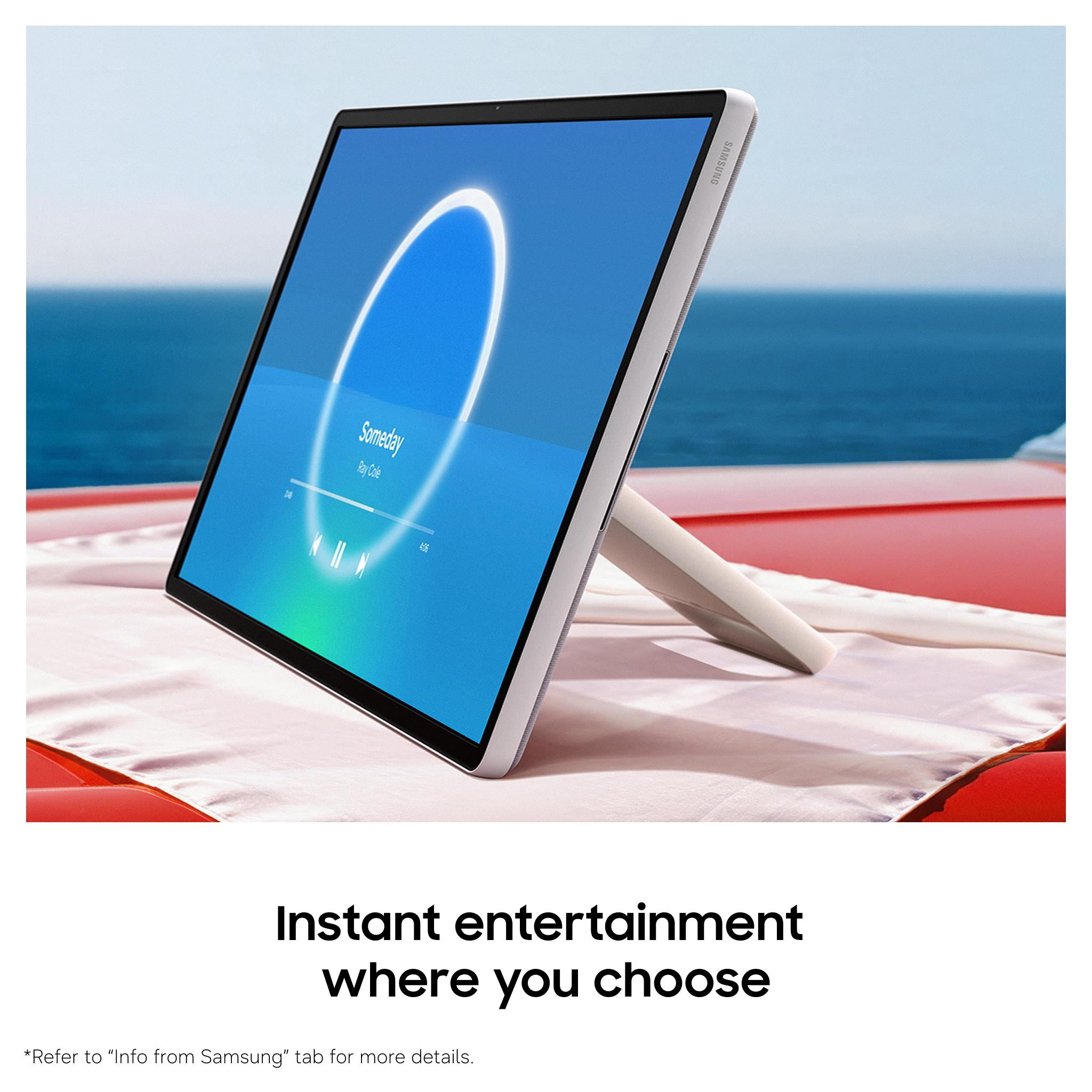 White smart TV on stand displaying interface, angled toward viewer
