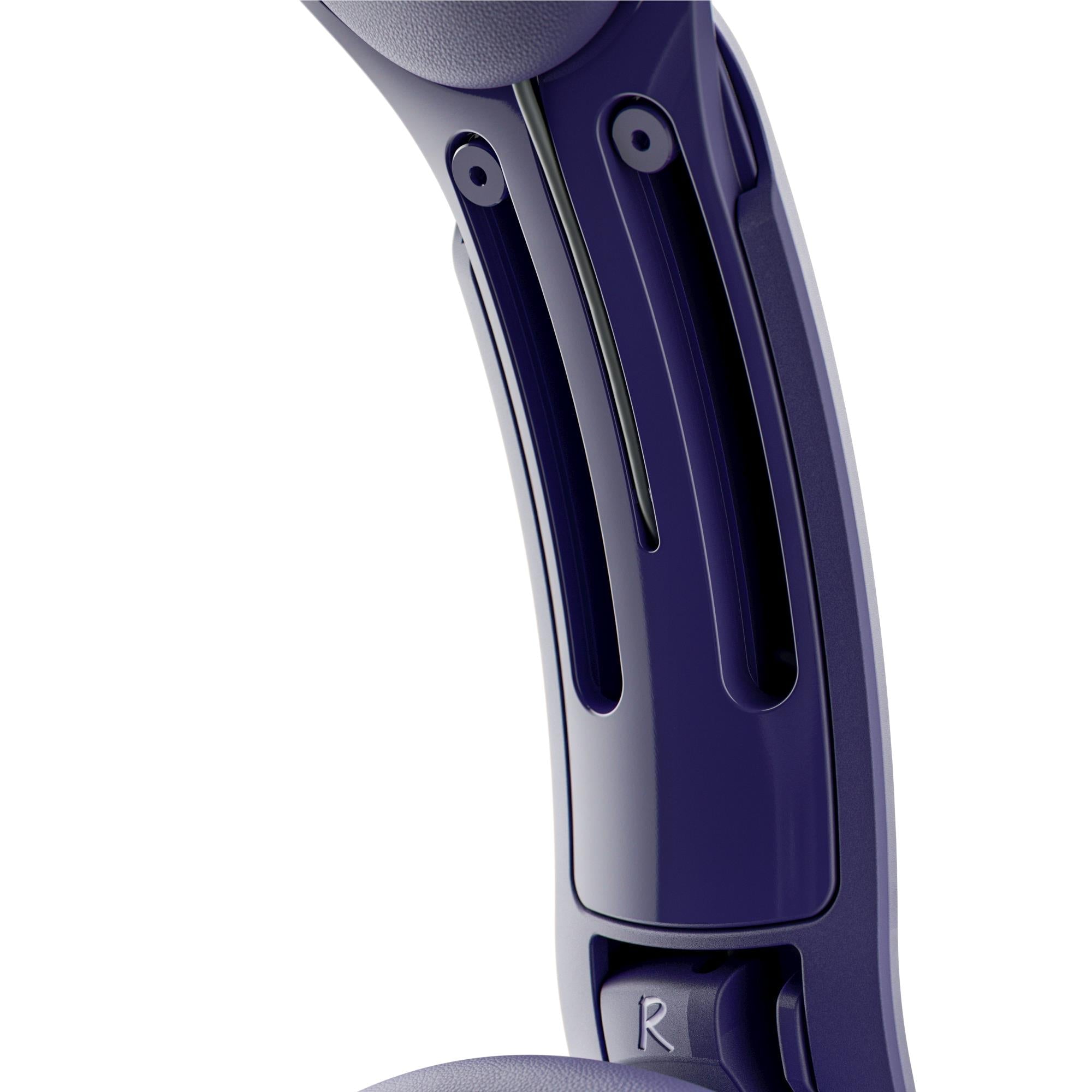Close-up of headphone side controls on dark purple ear cup and arm