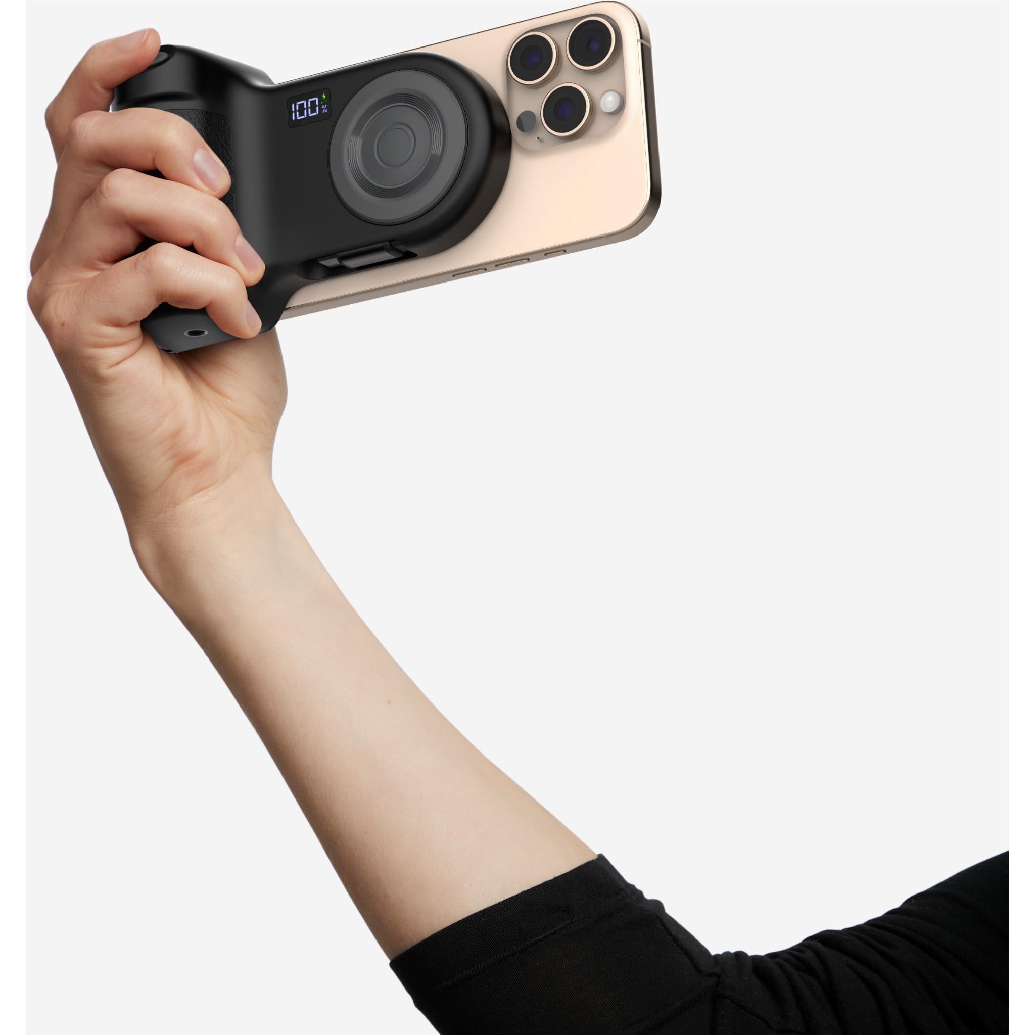 Charcoal camera grip power bank held in hand, attached to phone back