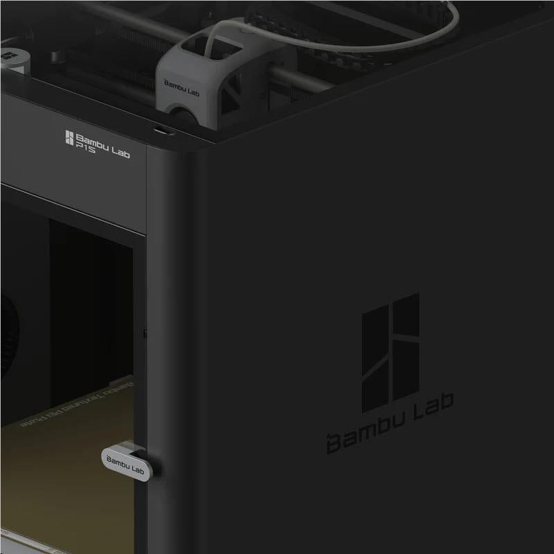 Enclosed 3D printer side view with logo and access door near build area