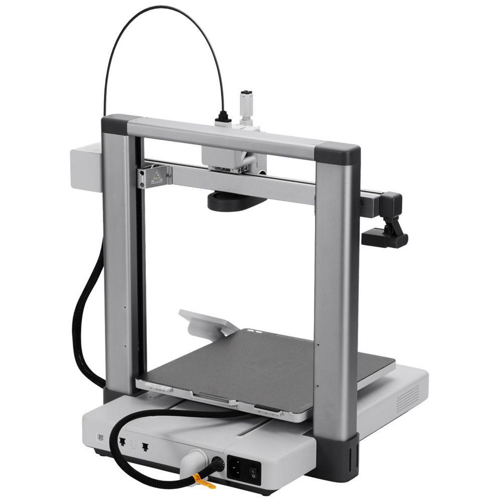 Open-frame 3D printer view showing rear frame, build plate, and control ports