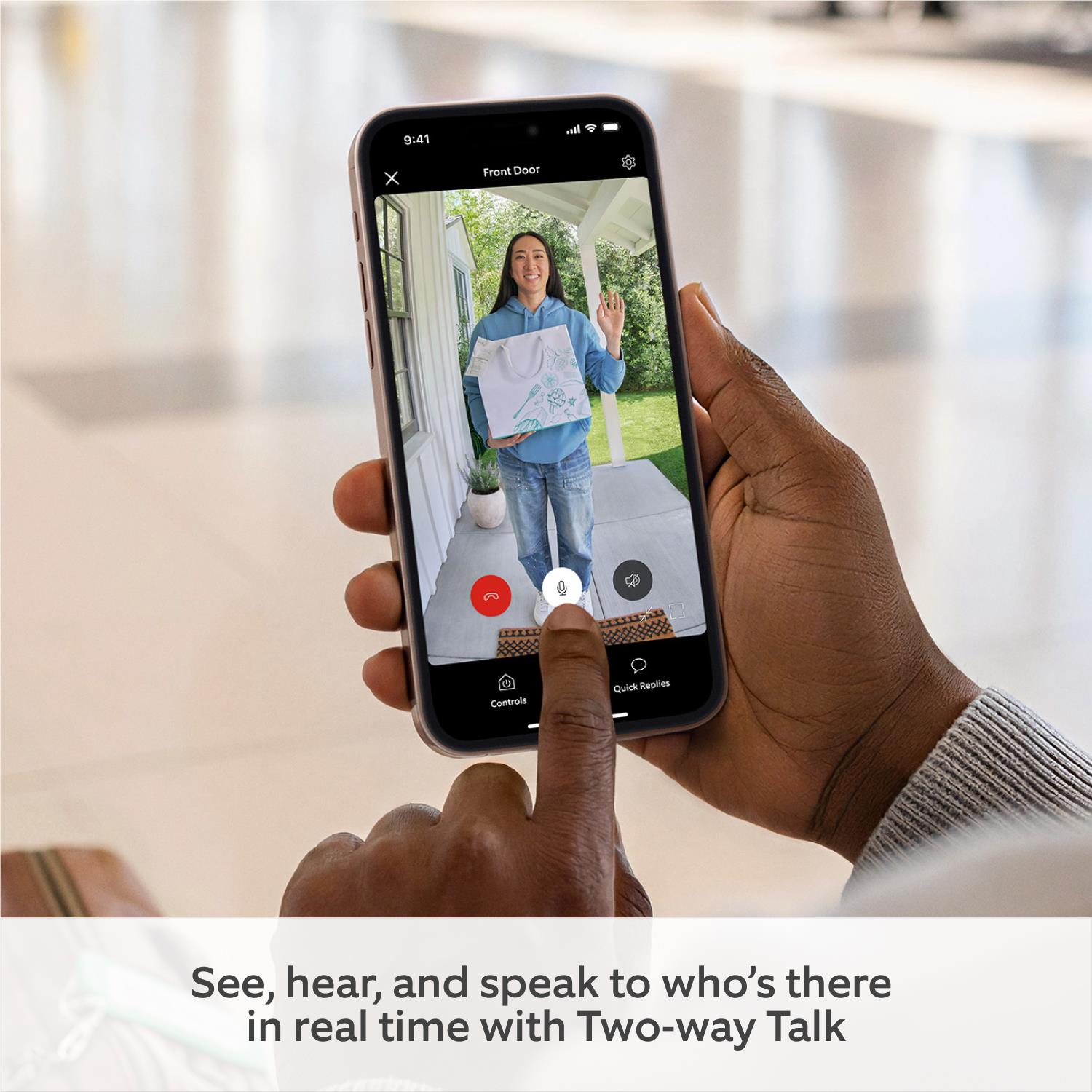 Smartphone displaying front-door live video with two-way talk controls