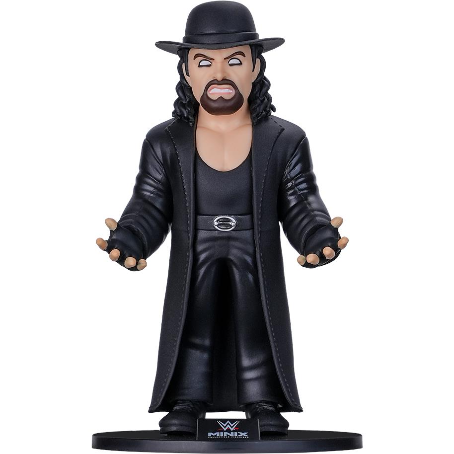 Undertaker collectible vinyl figure in black hat and long leather coat on display base