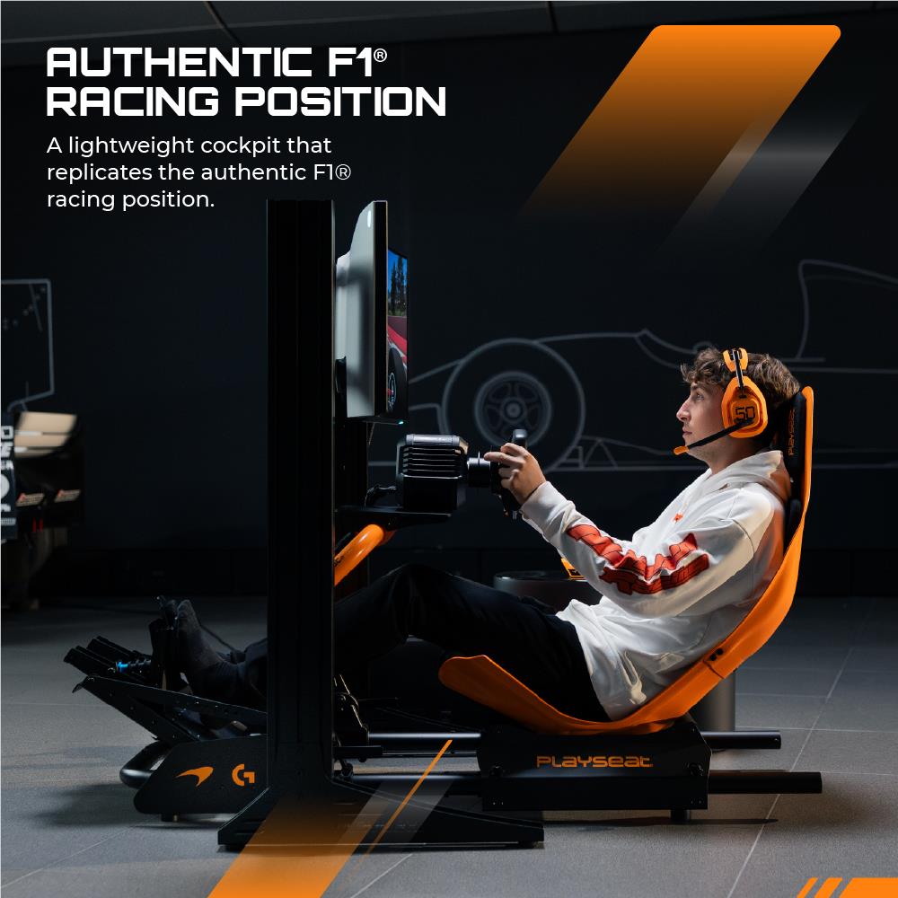 Orange racing simulator seat with headrest and side supports in cockpit view