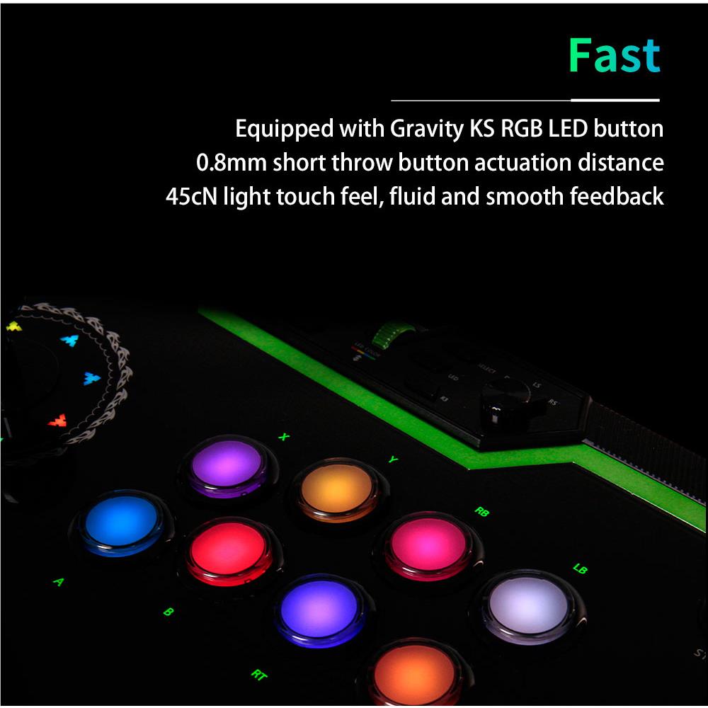 Black arcade fight stick with multicolor LED buttons and green accent panel edge