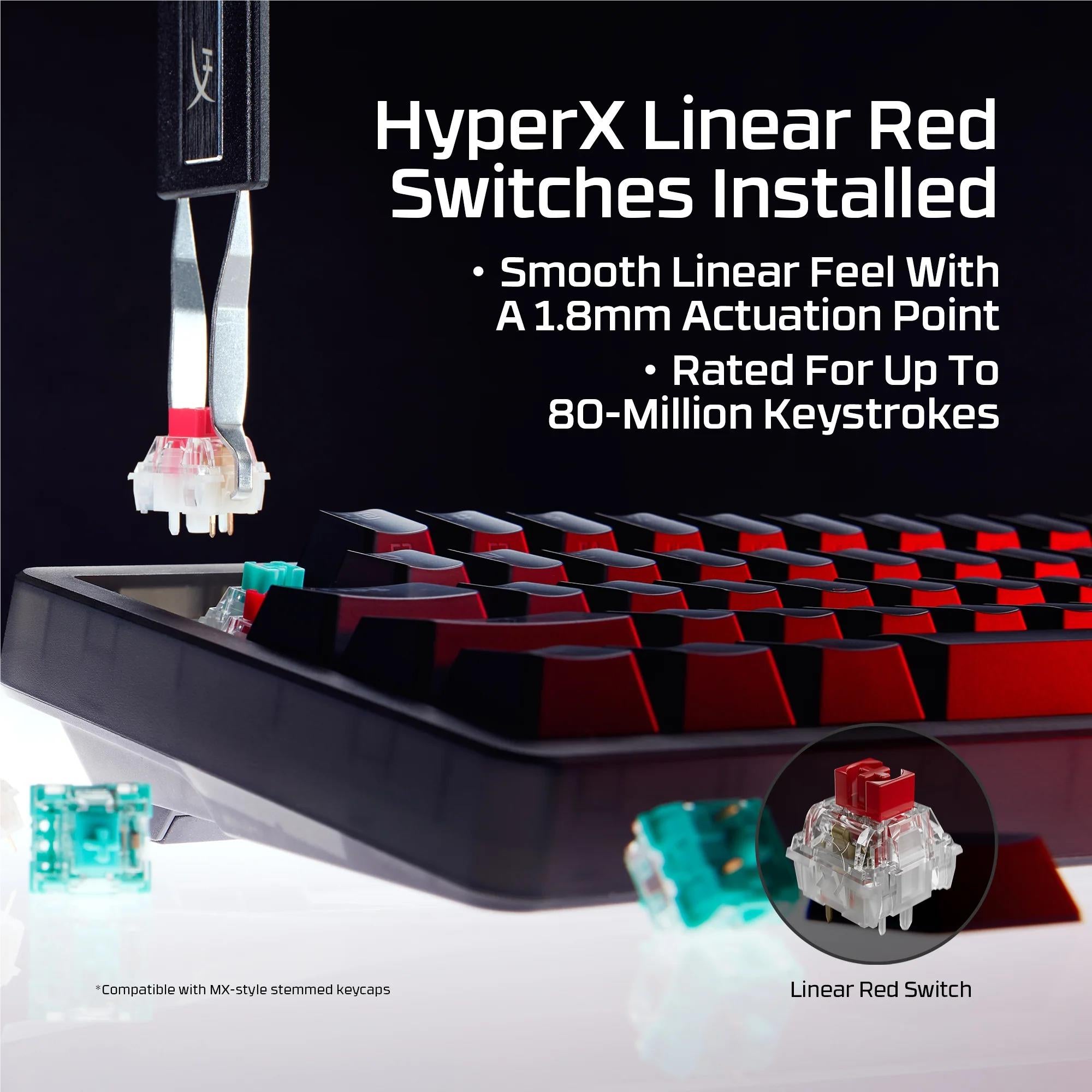 Keyboard with installed red linear switches visible and switch housings in close-up