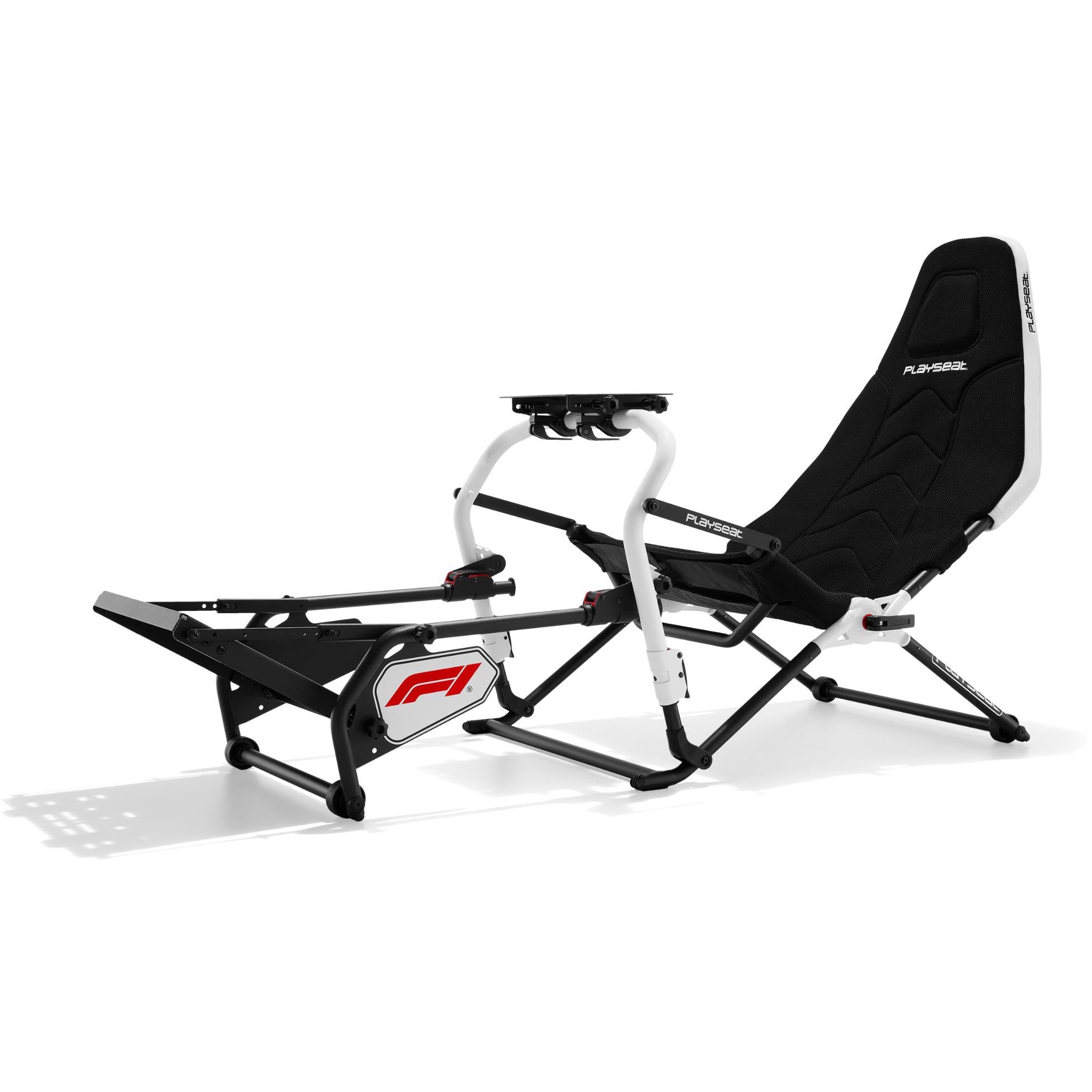 Foldable F1 sim racing cockpit with black seat and white frame, front pedal plate