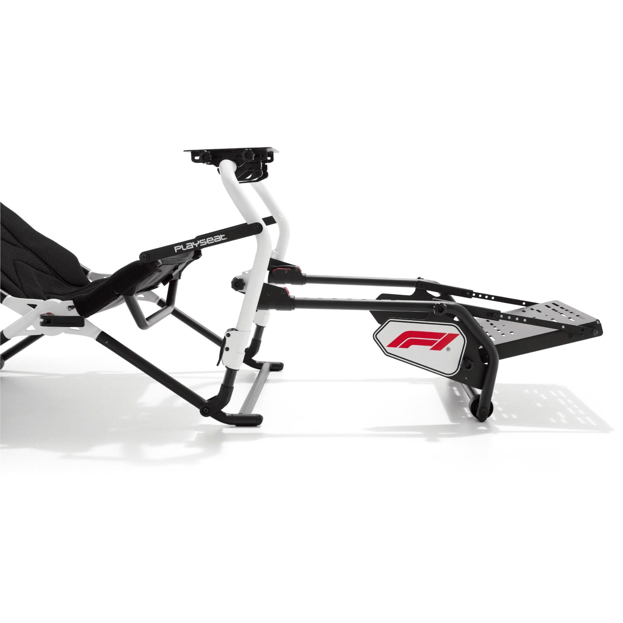 Sim racing cockpit with front platform and white arm support, black seat and frame