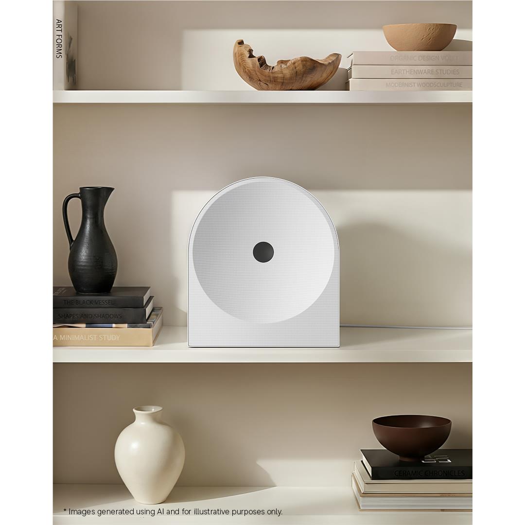 White tabletop smart speaker with circular port on a shelf