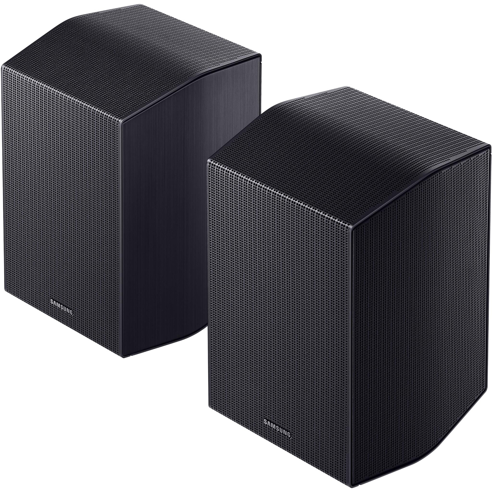 Two dark gray satellite speakers with textured front grilles