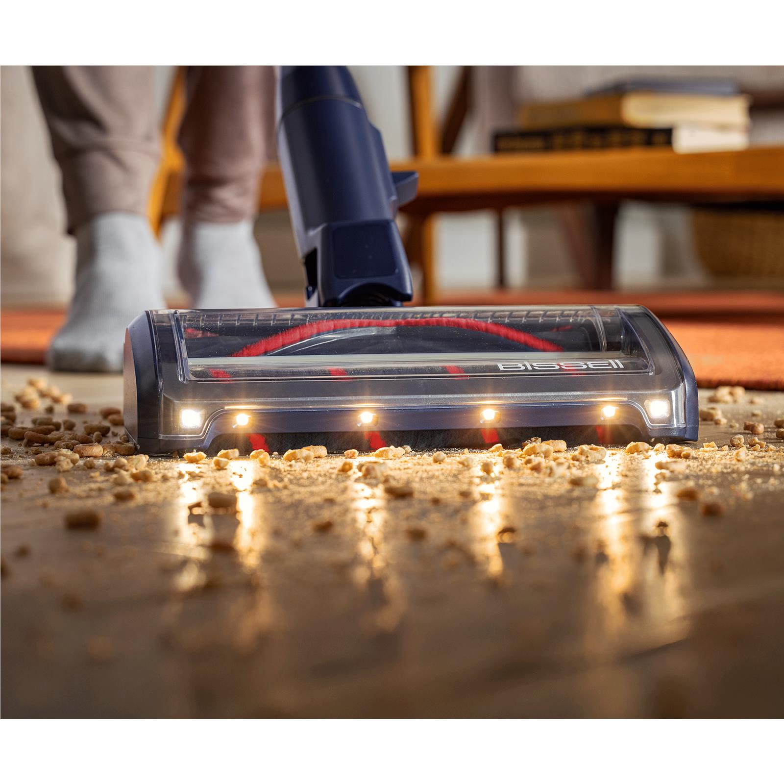Bissell PowerClean brush head with front lights on carpet debris
