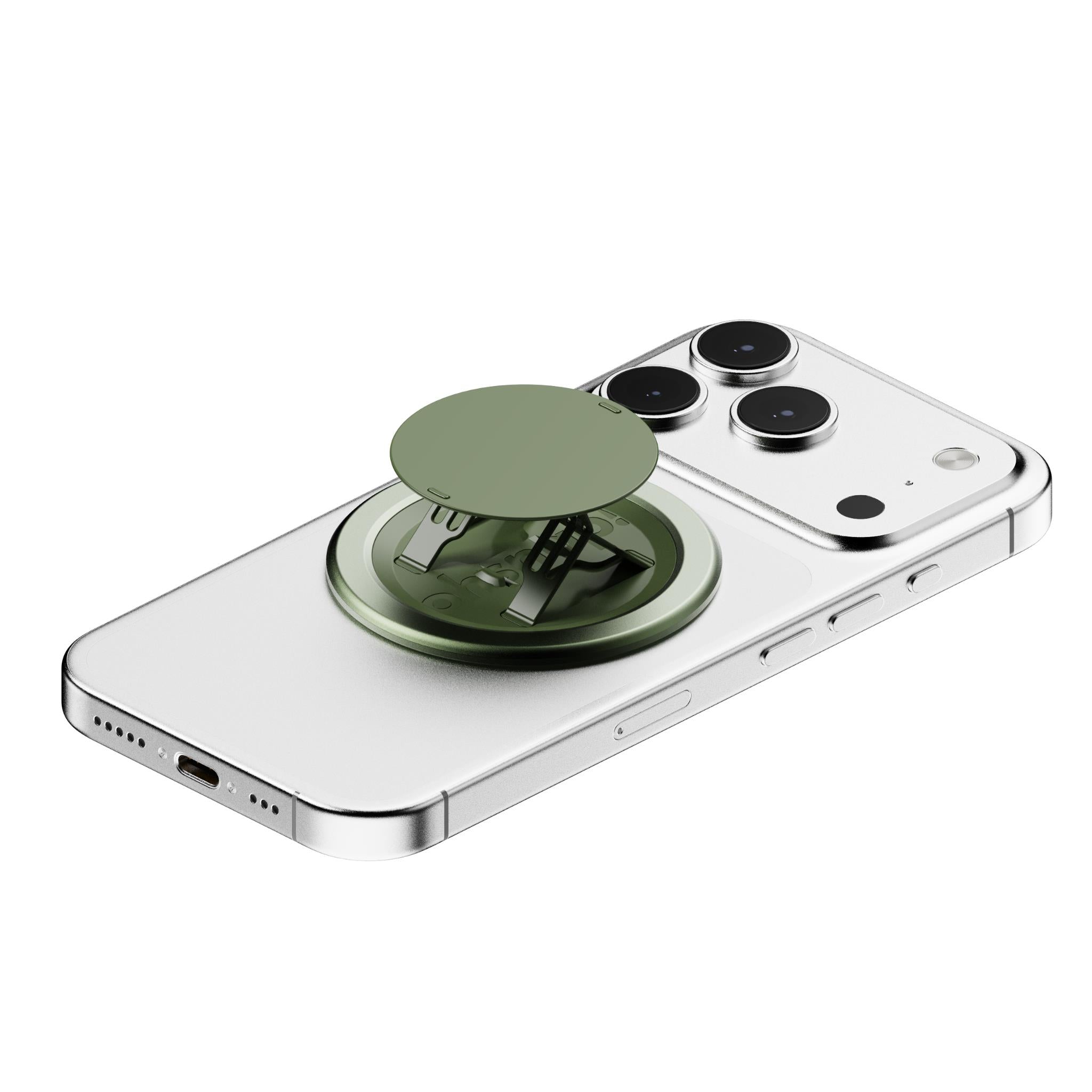 Green magnetic phone grip stand on the back of a silver smartphone