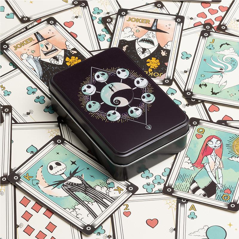 Playing cards deck in black tin with illustrated Nightmare-style card backs