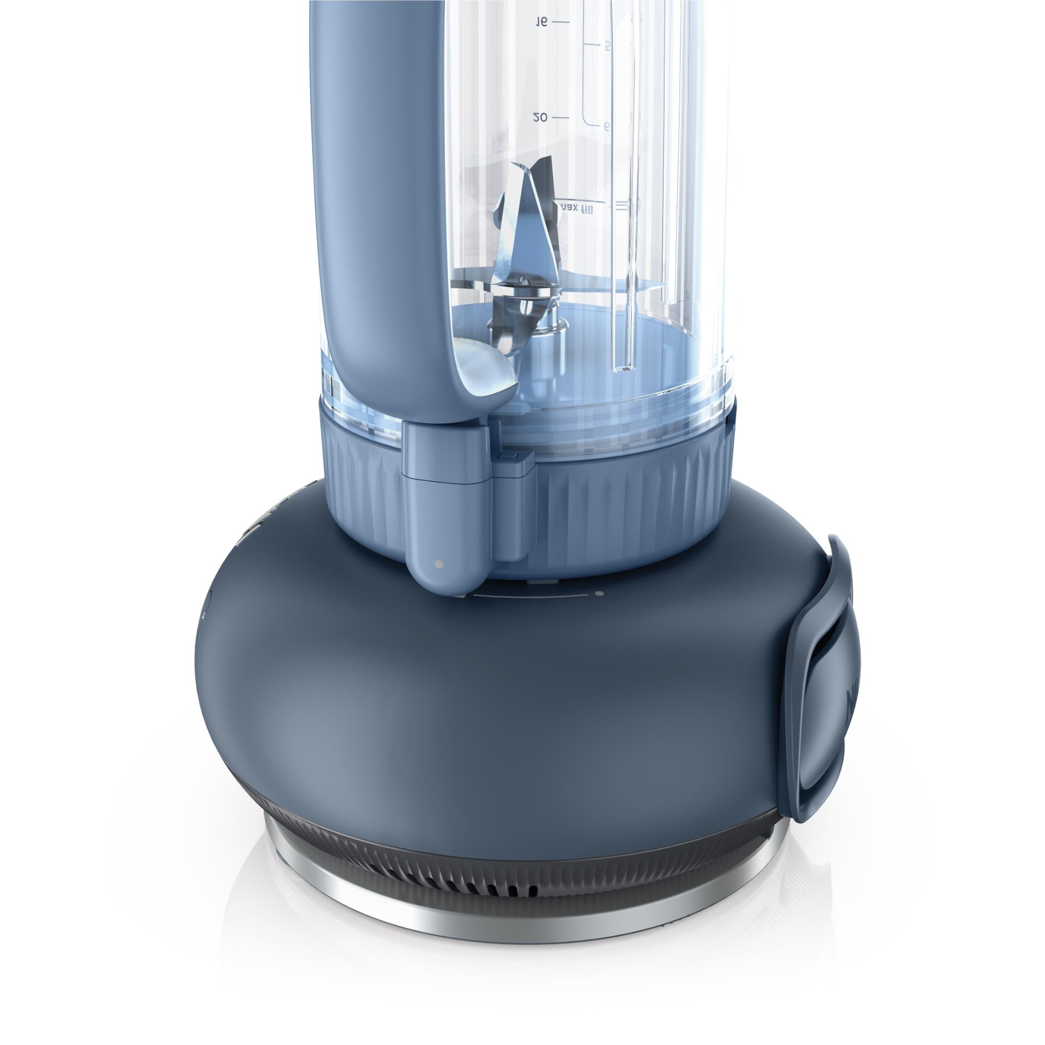 Ninja tumbler blender with clear jar and blade assembly, side view on dark base