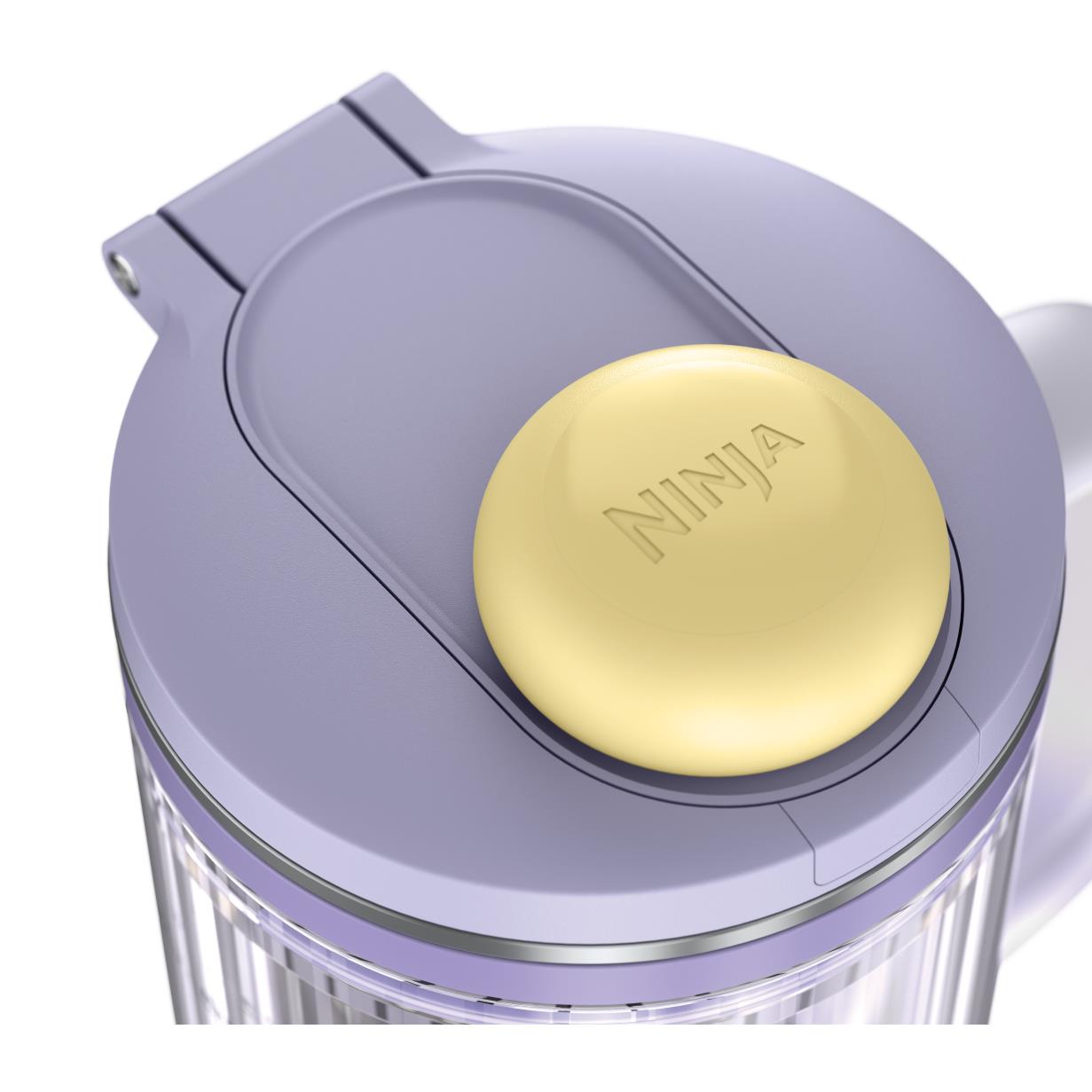 Lavender blender lid with golden cap on top of clear jar